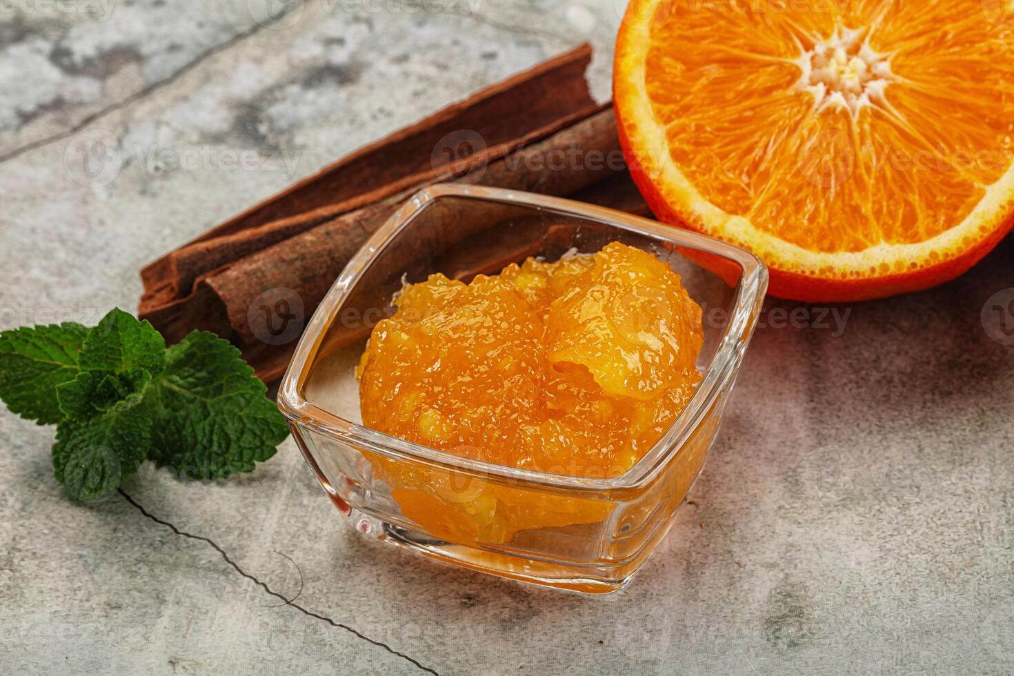 Tasty homemade Orange jam in the bowl photo