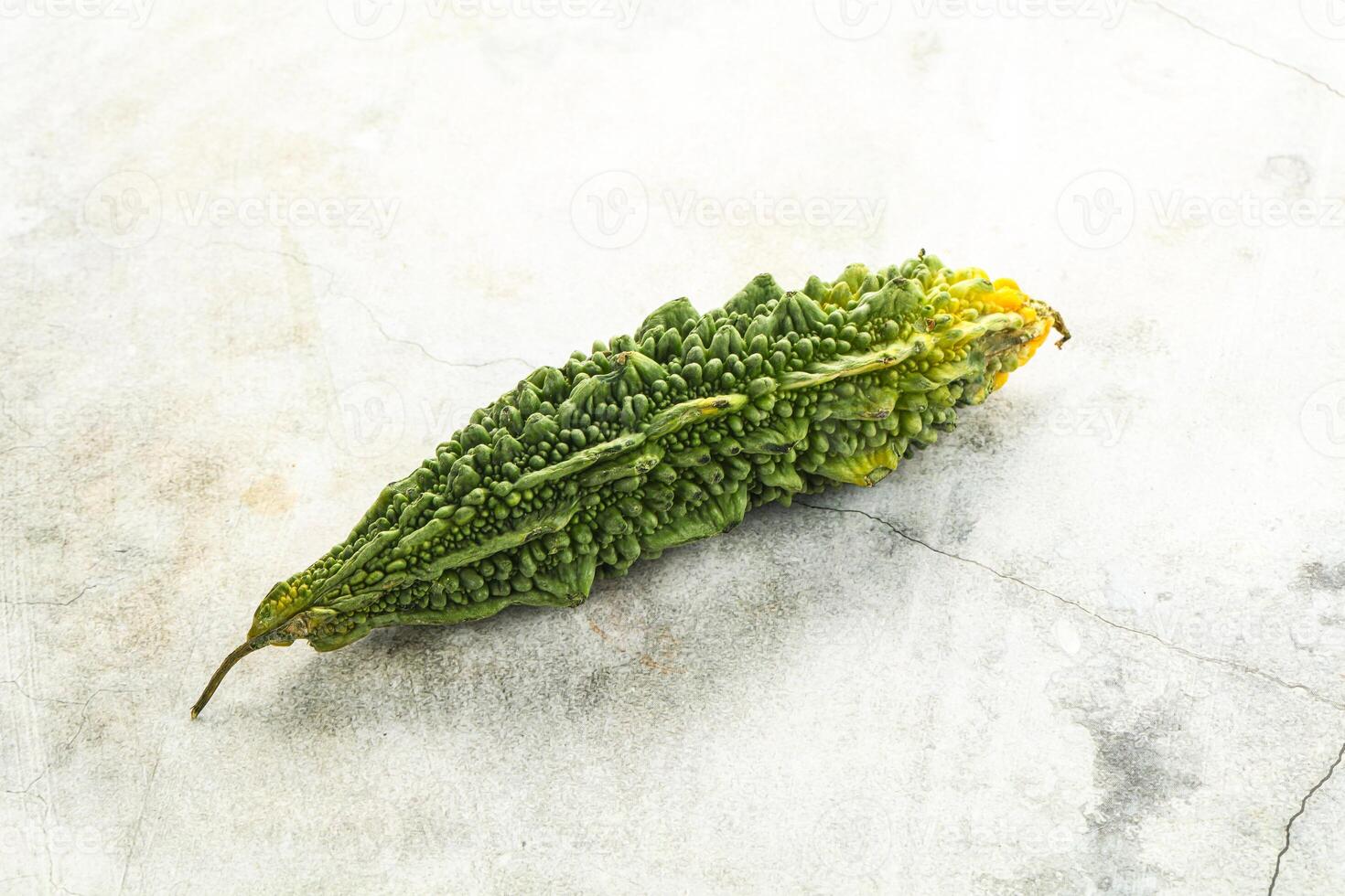 Raw green exotic tropical bitter melon photo