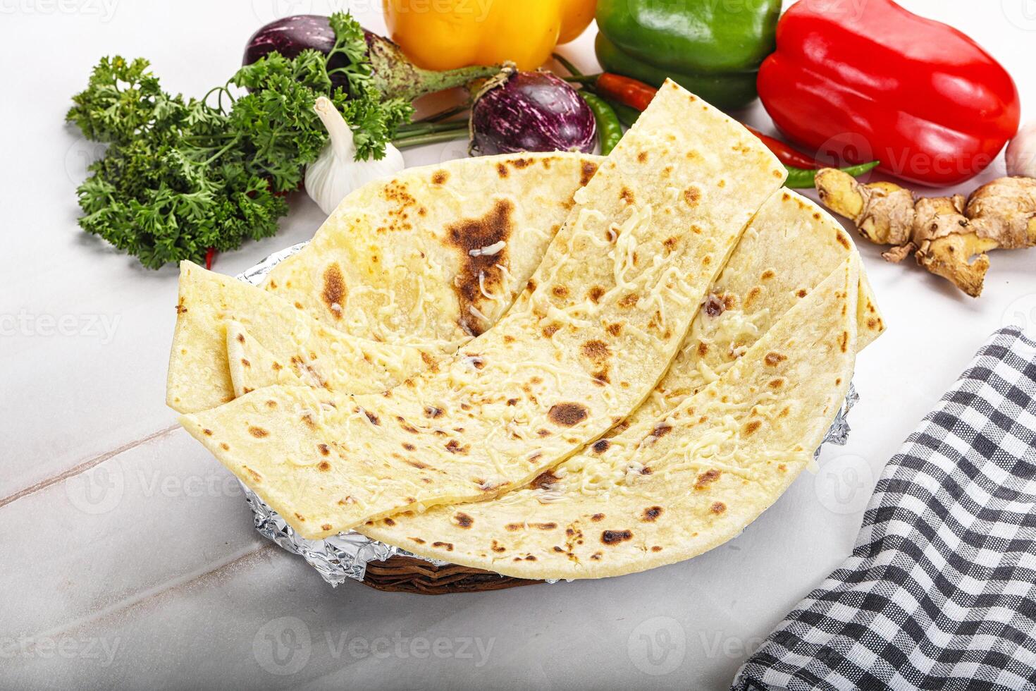 Indian bread cheese garlic naan photo