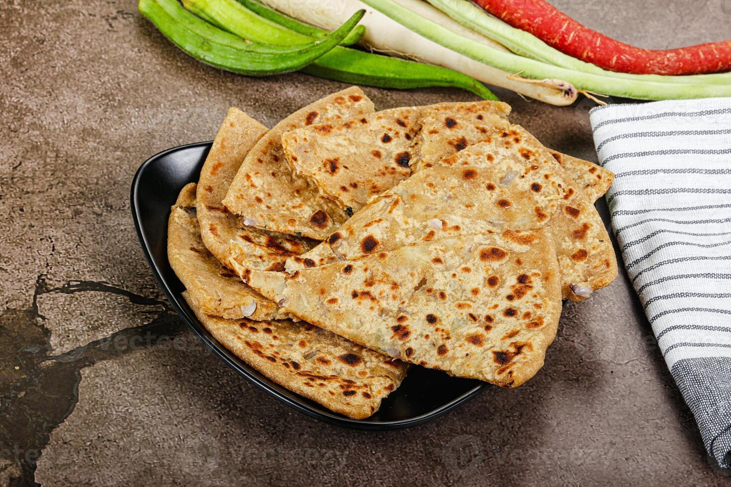 Indian Aloo Paratha - bread with potato photo