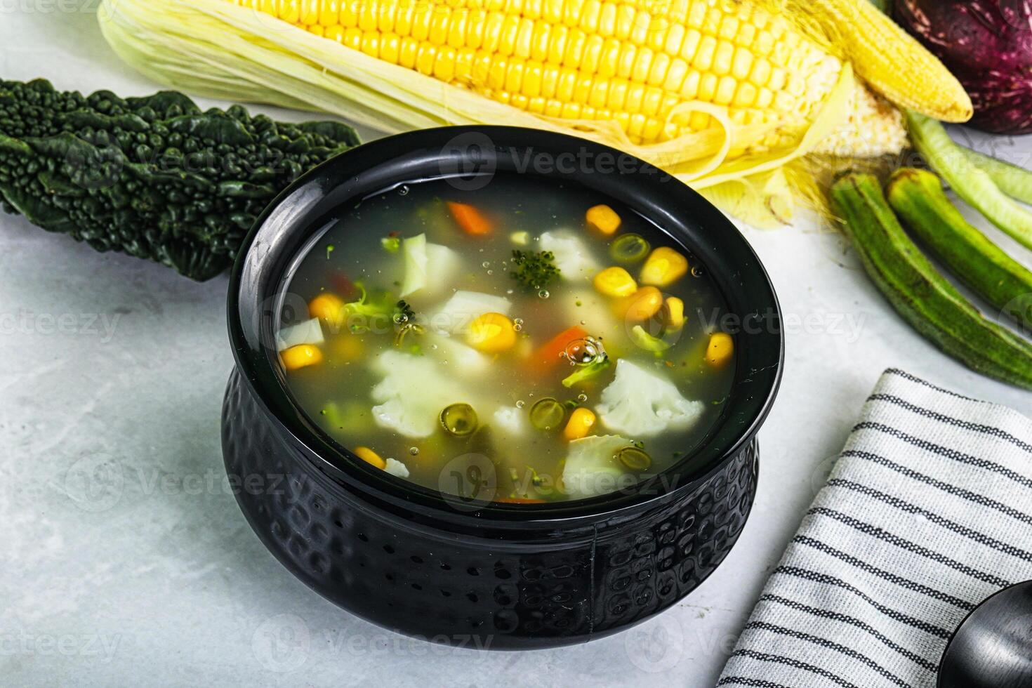 Soup with corn and broccoli photo