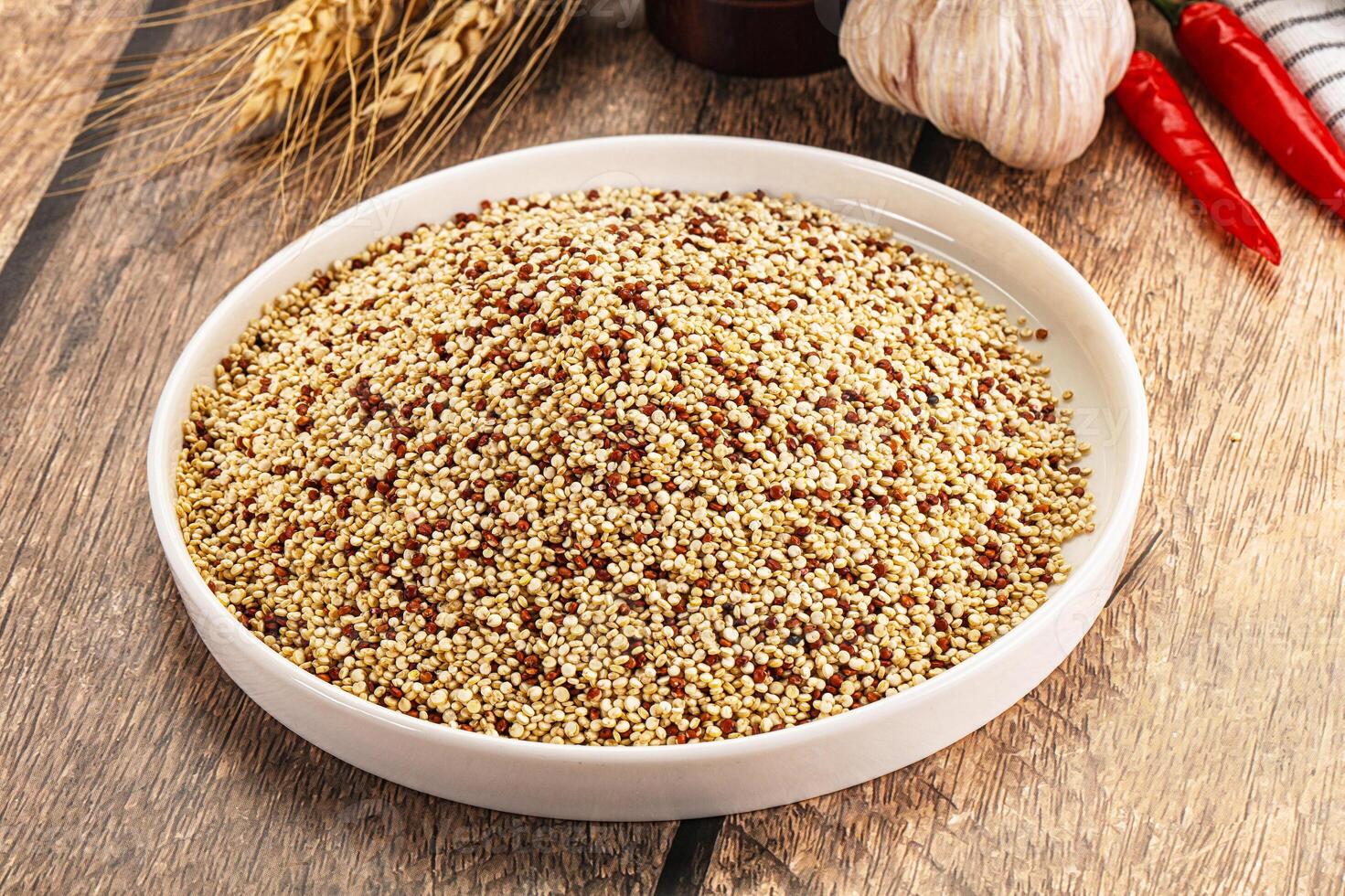 Raw dry quinoa seeds cereal photo