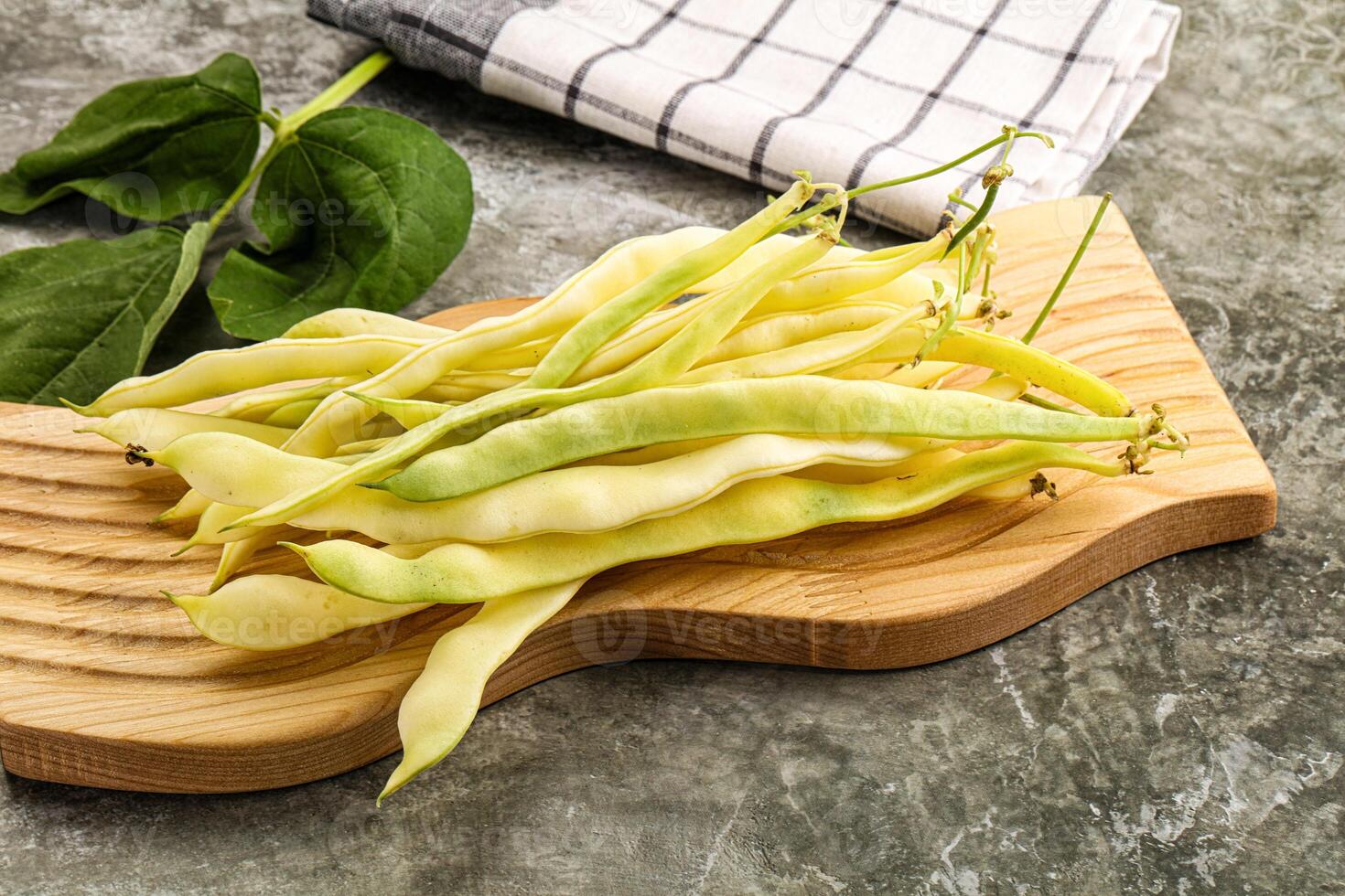 Raw green bean strings heap photo