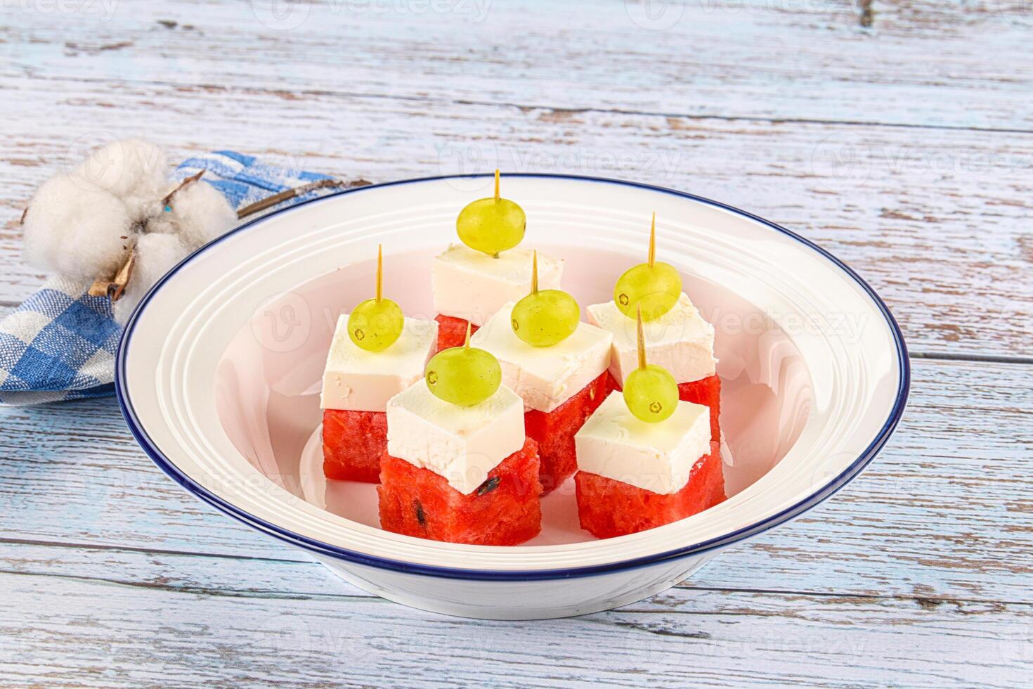 Watermelon with feta and grape photo