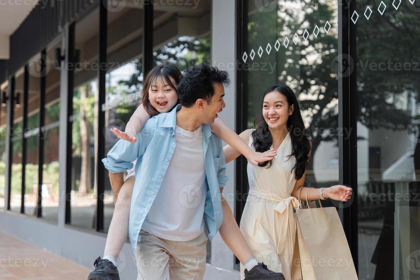 Joyful Family Shopping Experience with Parents and Children Enjoying a Day Out in the City photo