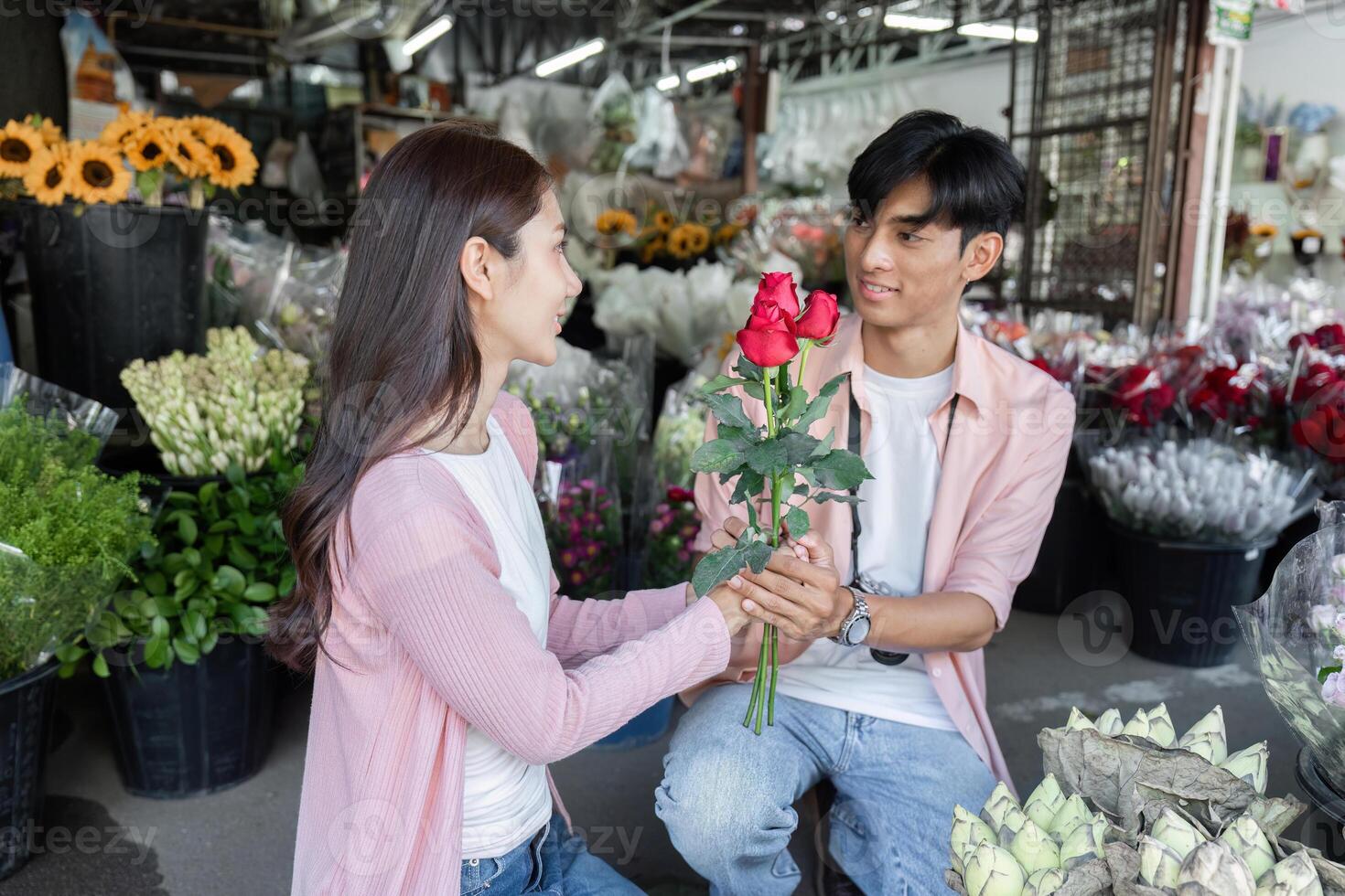 Valentine's day surprise for lovers in a flower shop romantic couple intimate moment natural setting joyful expression photo