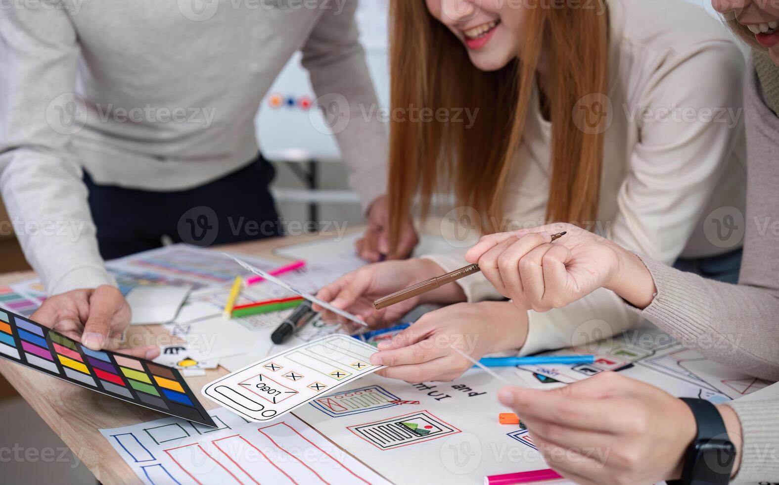 Brainstorming session for the creative team of designers in application design and implementation planning ux ui Teamwork of modern business teams photo