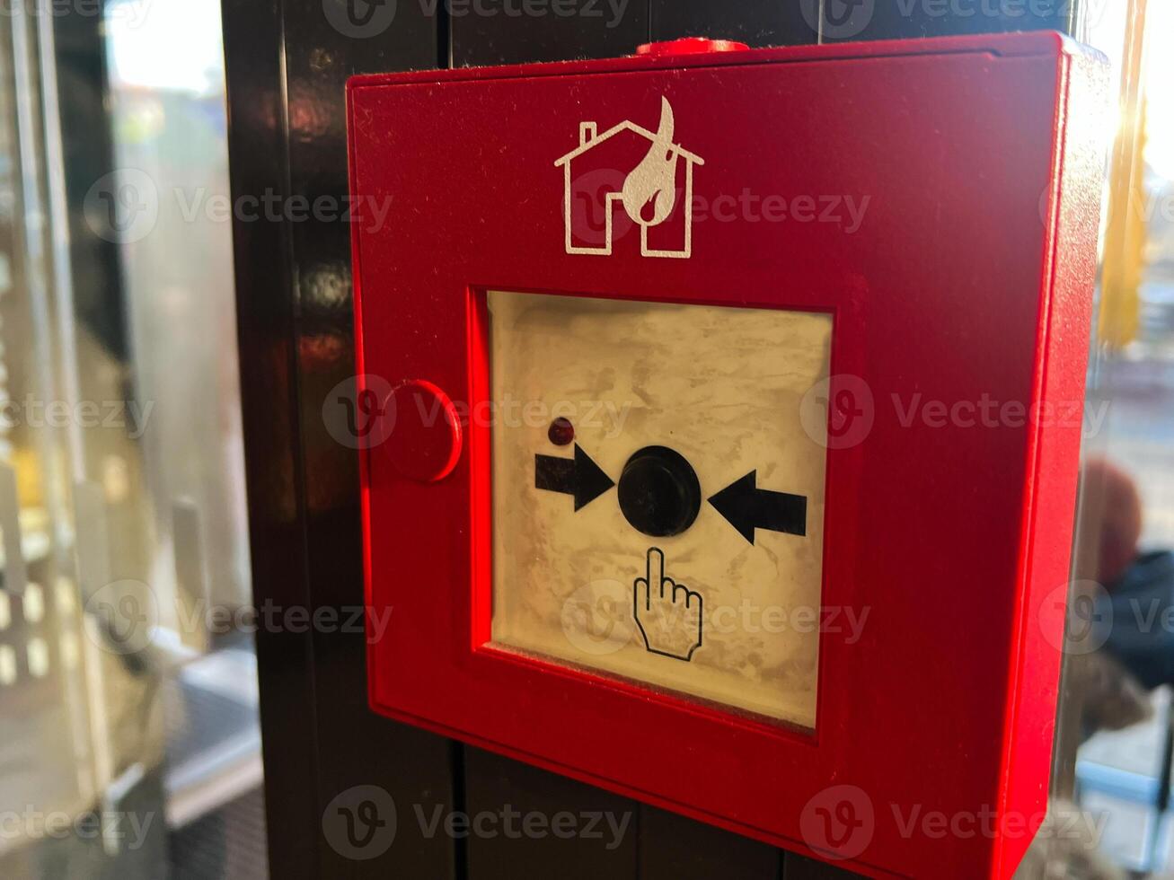 Close-up of a Fire Alarm Button in a Public Space photo