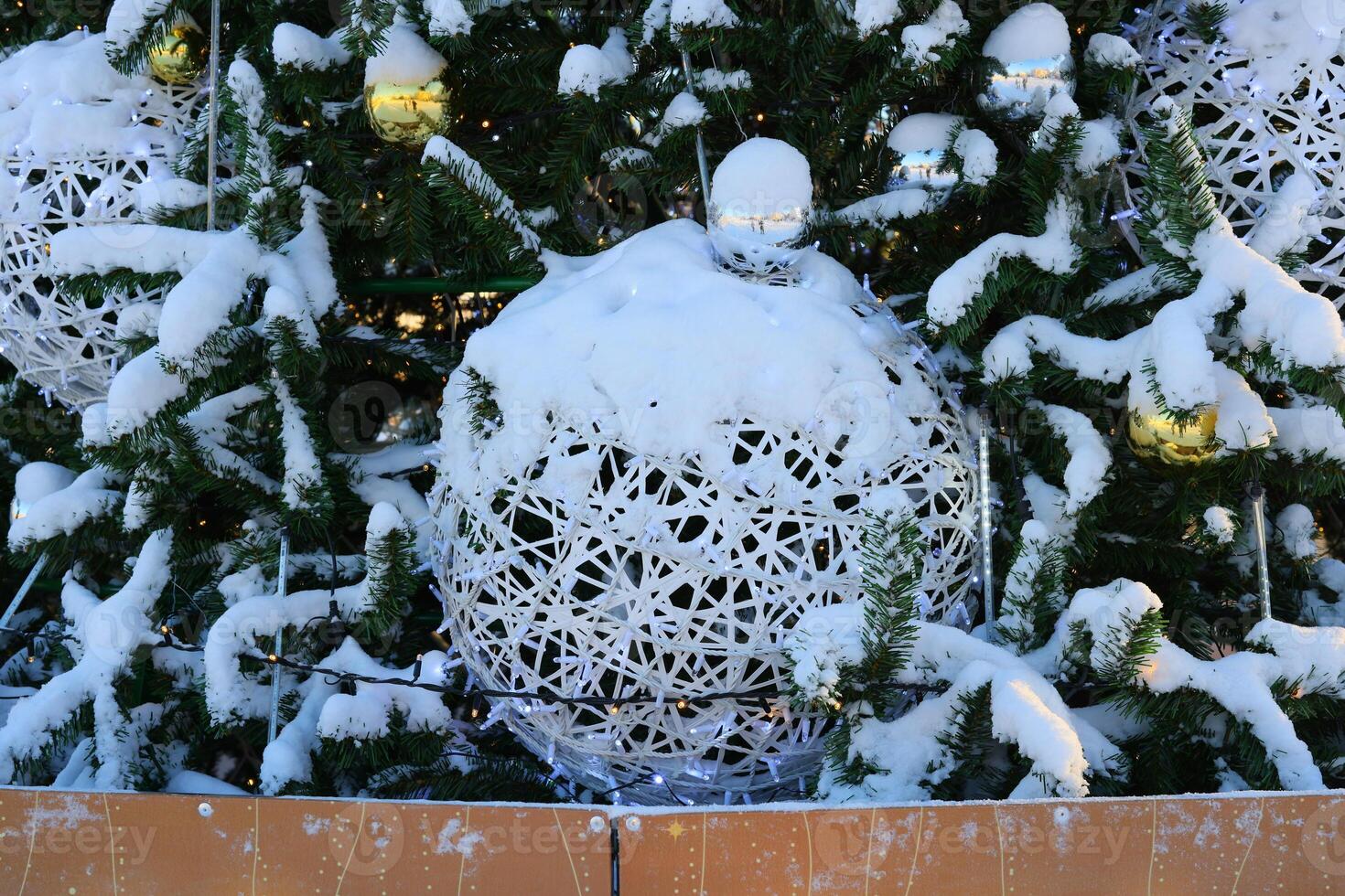 Enjoy the enchanting Winter Wonderland Christmas Decorations adorned with snow this season photo