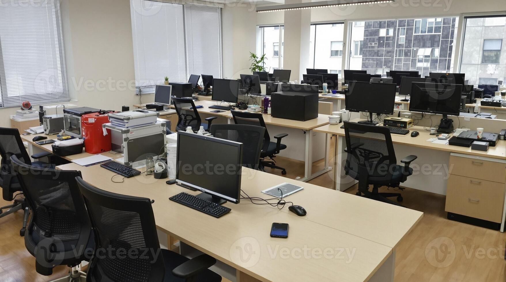 This is a modern office space filled with workstations and equipped with advanced computers photo
