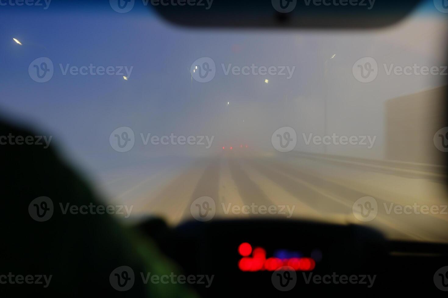 Driving Through a Challenging Snowstorm Blurred Vision, Harsh Conditions, and Increased Risks photo