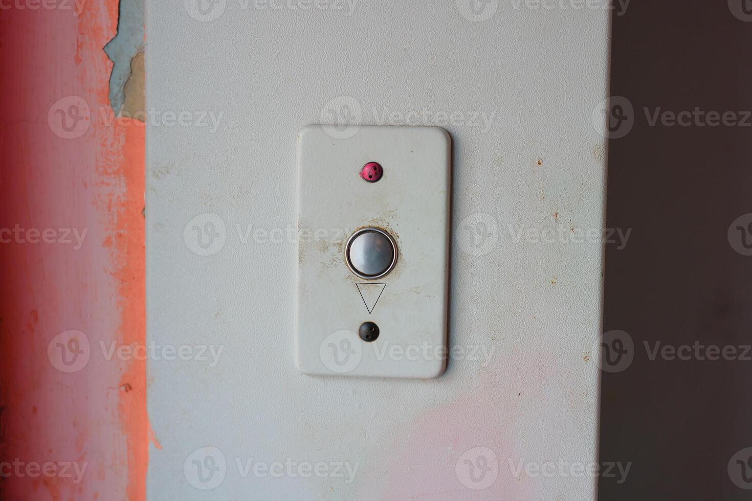 The Elevator Call Button situated prominently on the Wall is a crucial accessibility feature photo