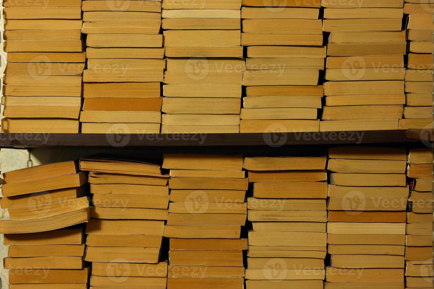 A visually appealing arrangement of stacked books intended for media stock purposes photo