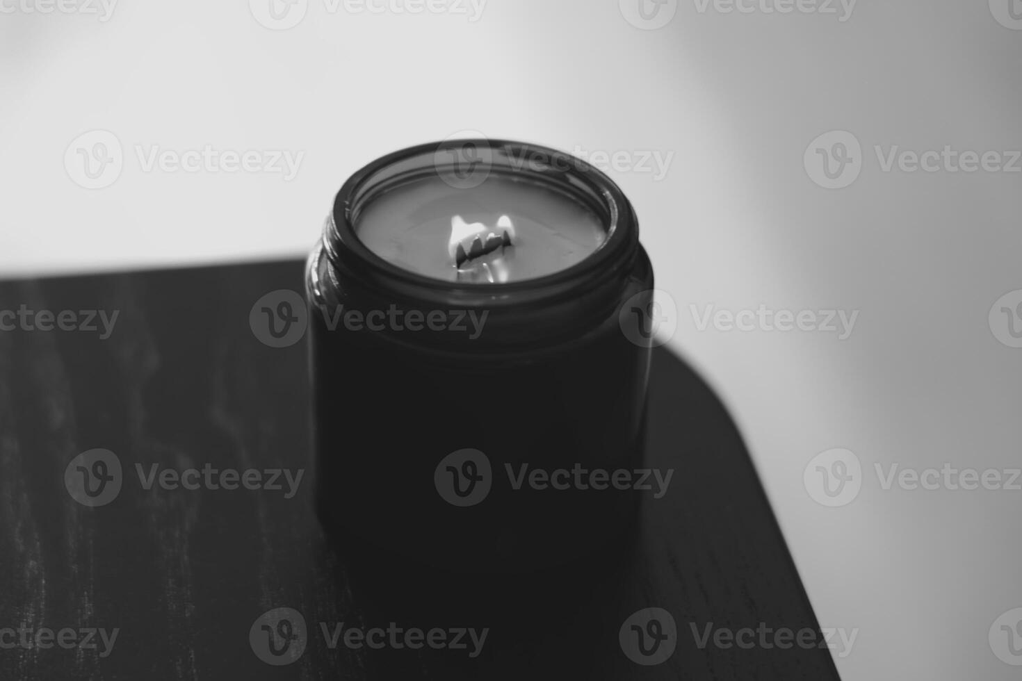 A striking black candle set within a minimalist design for an elegant and contemporary appeal photo