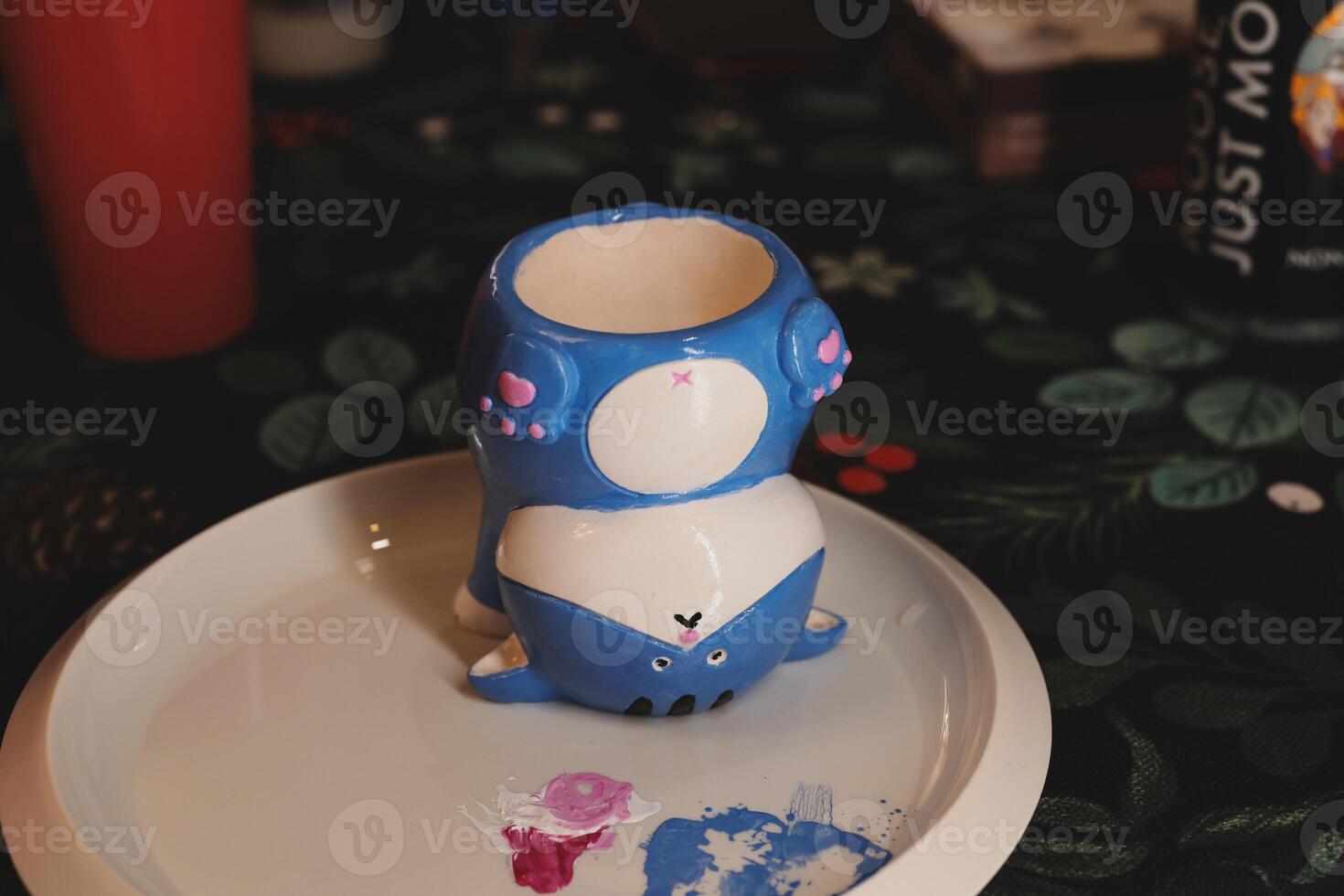 HandPainted Adorable Cute Ceramics Showcasing an EyeCatching Vibrant Blue Whale Design photo