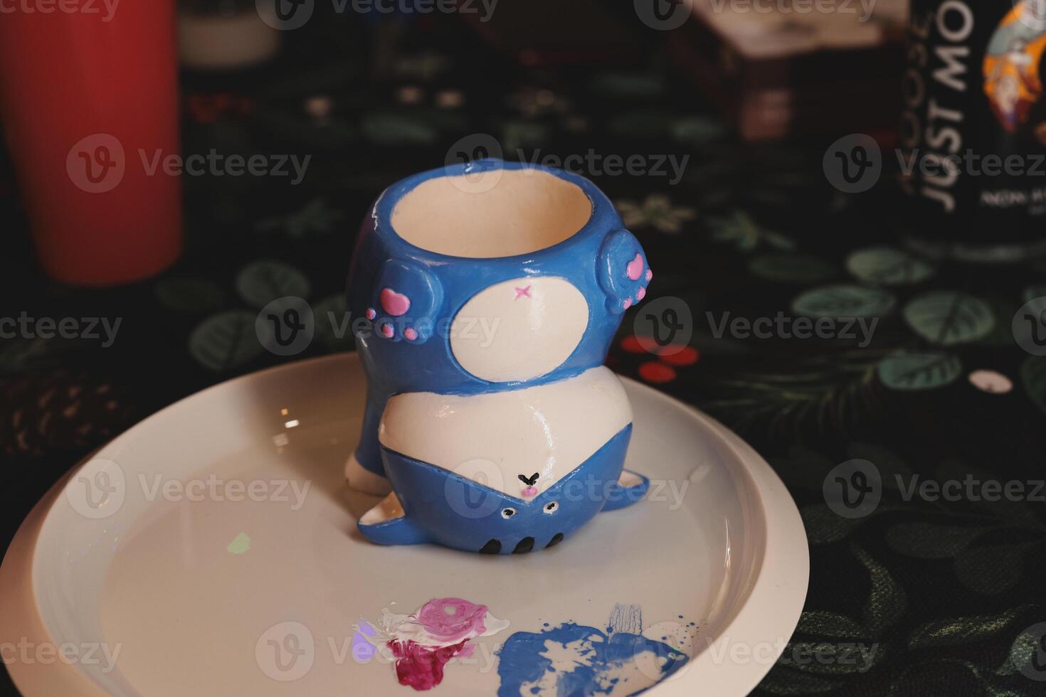 An Uniquely Whimsical and Colorfully Painted Shark Mug Featuring a Stunning EyeCatching Design photo