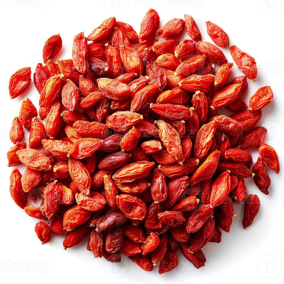 Heap of dried goji berries isolated on white background, top view photo