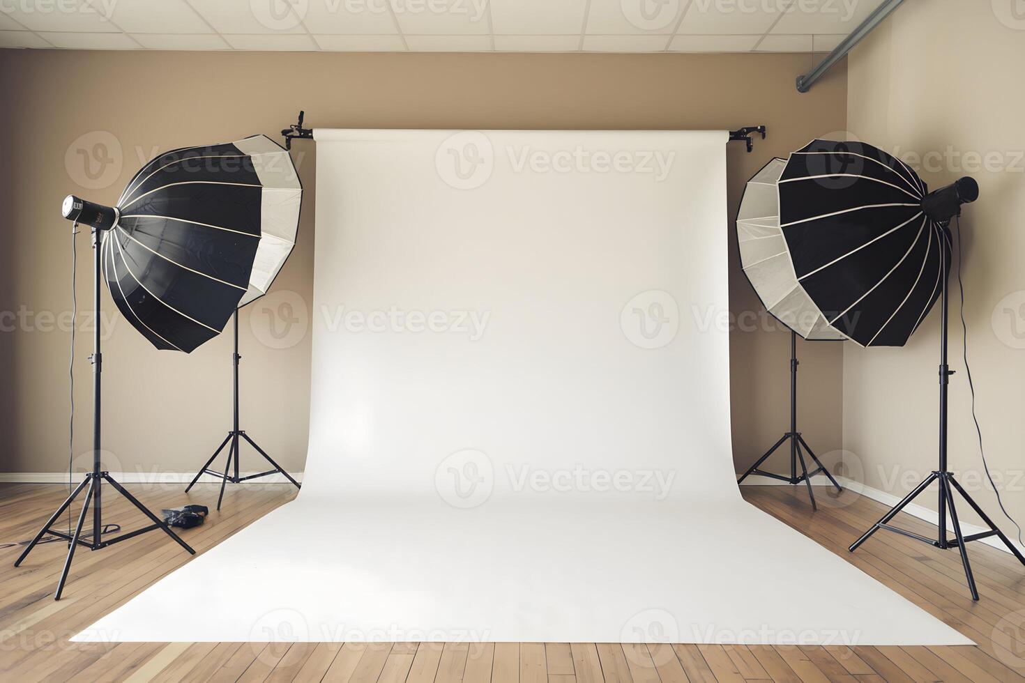Photography studio setup with white backdrop, black lights, and wooden flooring photo