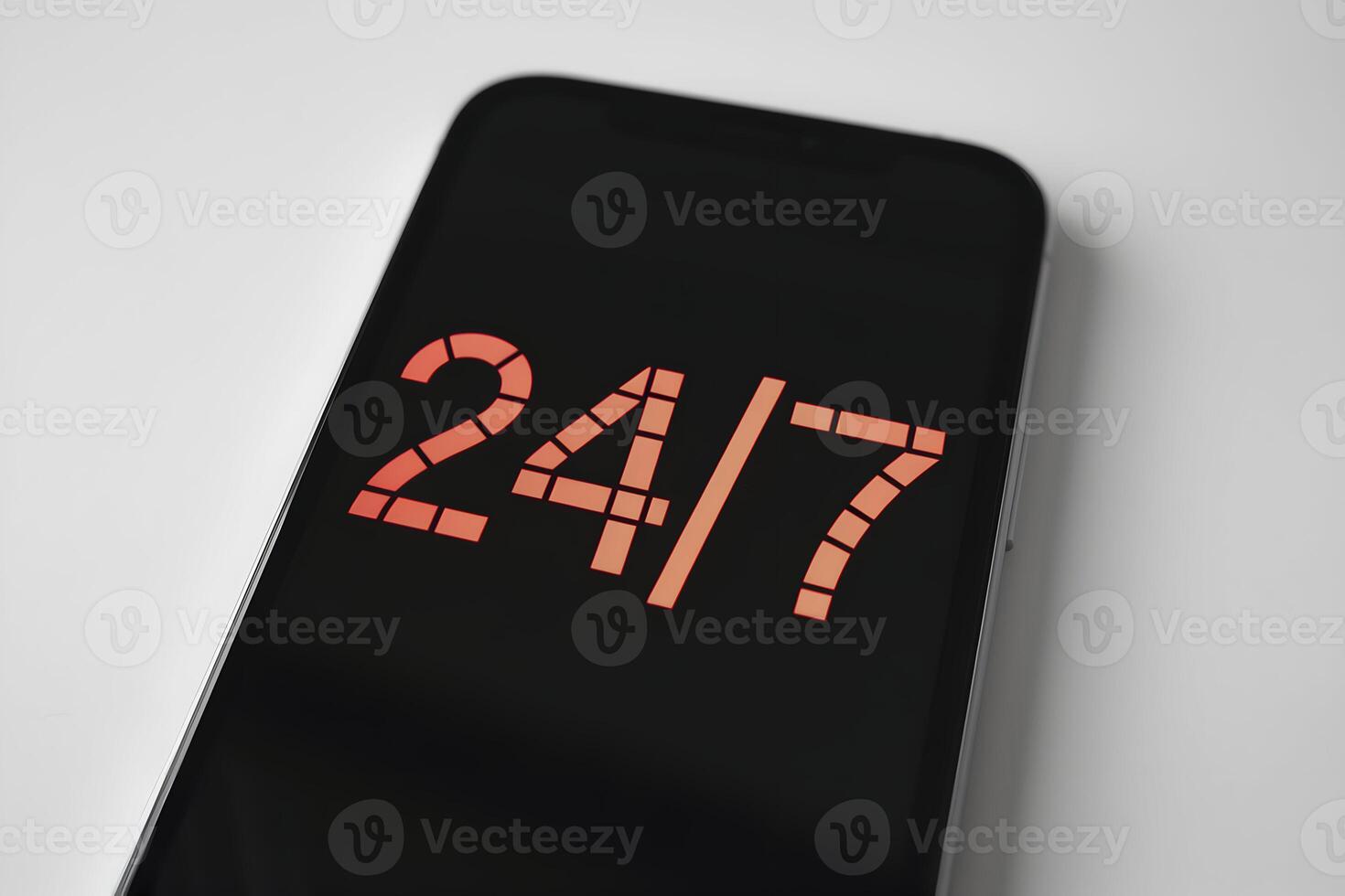 Smartphone displays 24 7 service on clean white background for simplicity photo