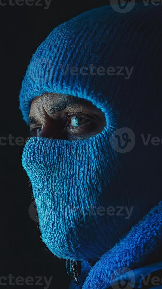 Mysterious Figure in a Deep Blue Mask photo