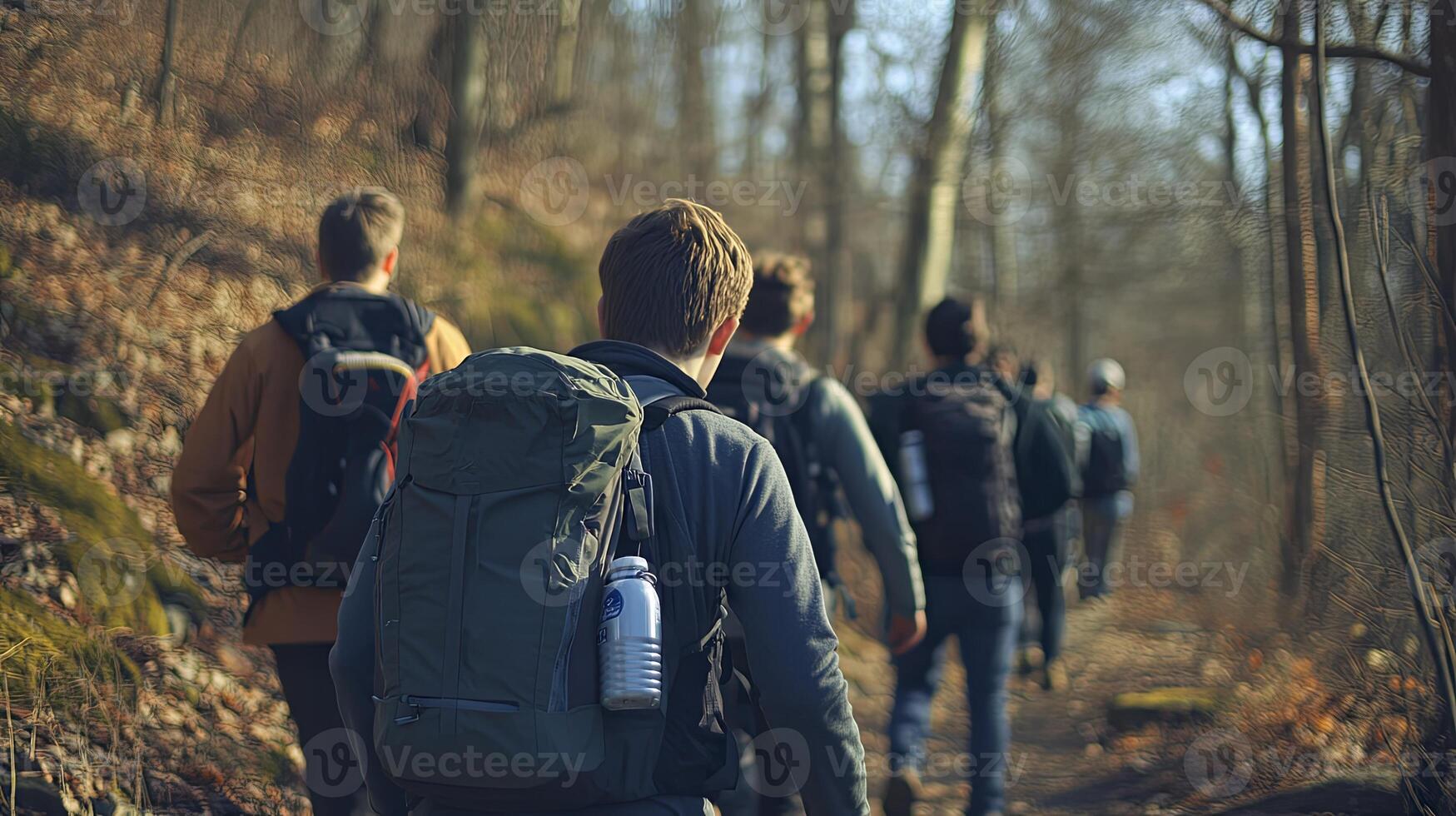 Hikers on a Fall Forest Trail photo