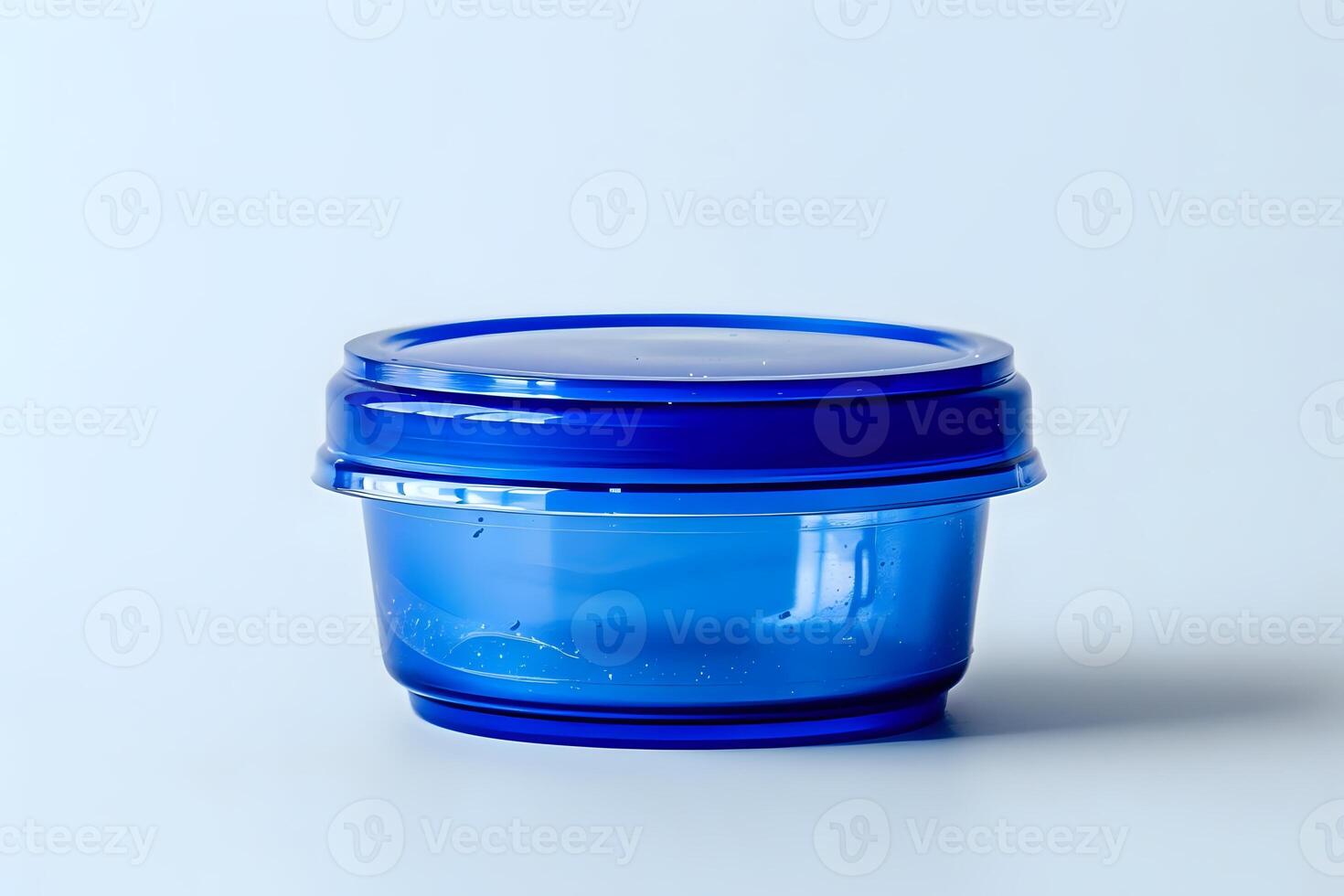 A Versatile Blue Plastic Food Storage Container with a Secure Lid for Convenient Kitchen Organization and Meal Prep, Perfect for Storing Leftovers and Snacks. photo
