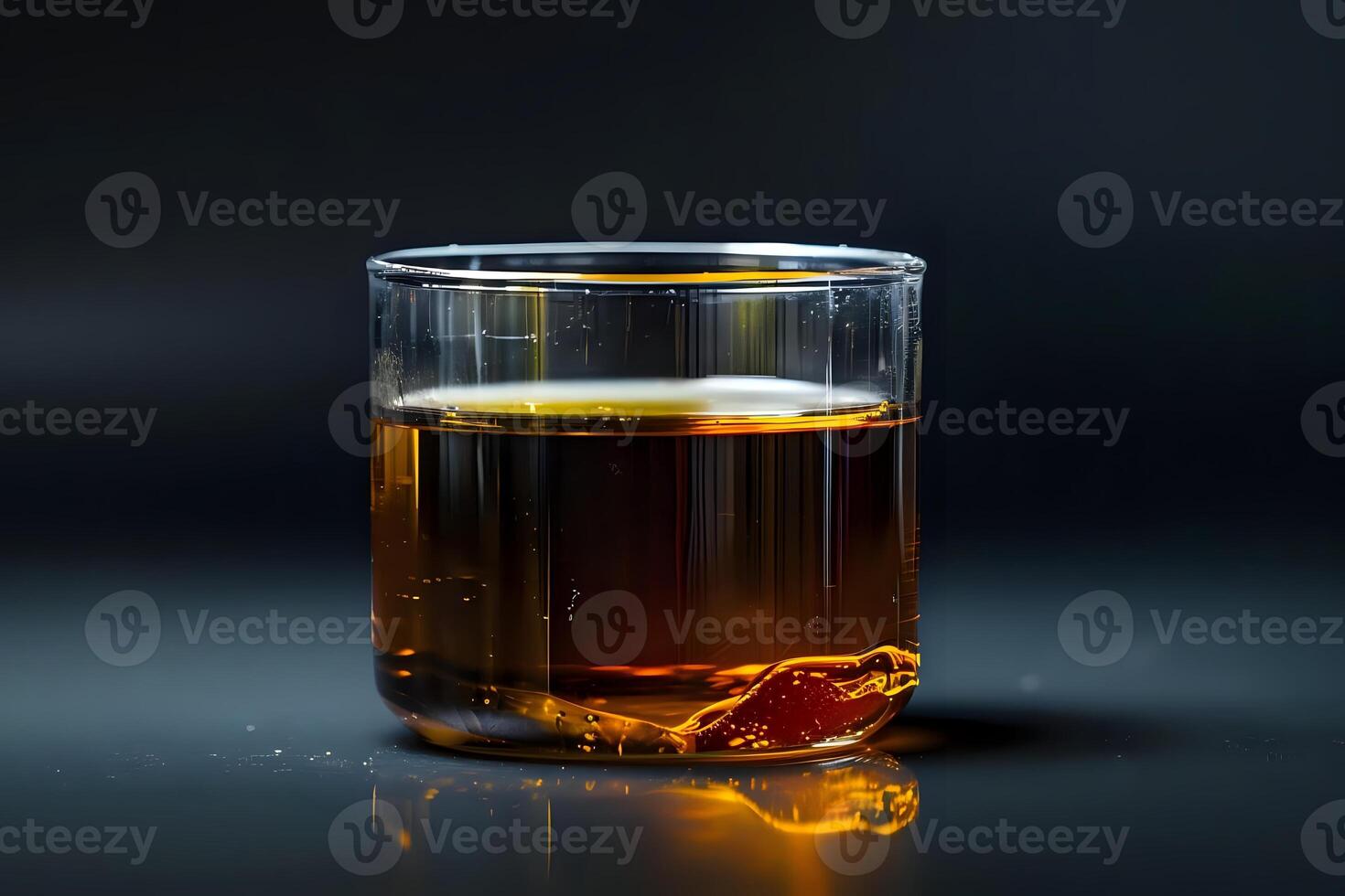 Amber Liquid in Glass. A Study of Color, Texture, and Light Reflection in a Transparent Vessel, Showing Viscosity and Density Properties with Submerged Object. Captivating Still Life Photography. photo