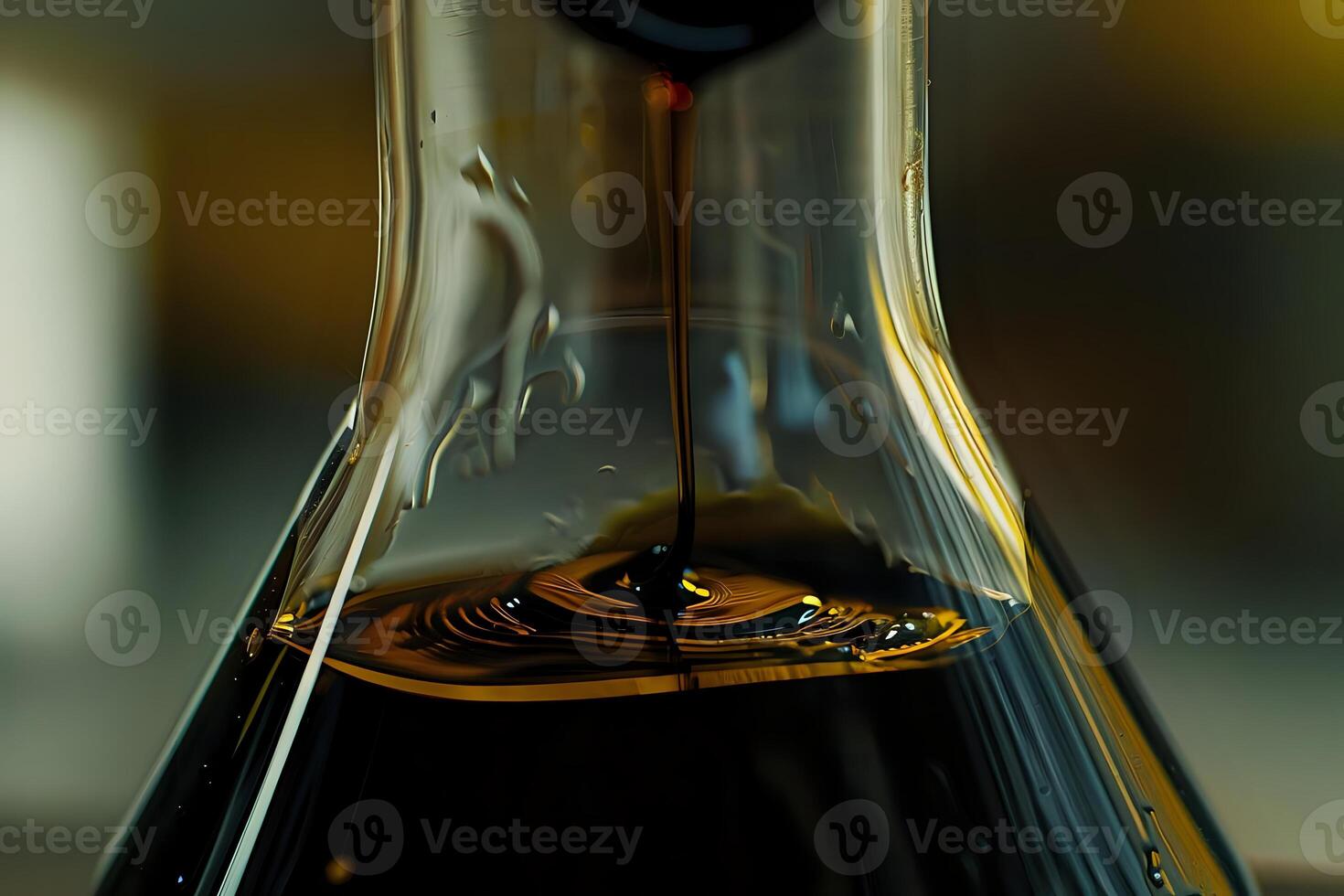 Dark Liquid Flows Slowly into Glass Vessel, Creating Intriguing Swirls and Reflections. Abstract Viscous Substance in Motion, Captivating Visuals of a Mysterious Fluid photo