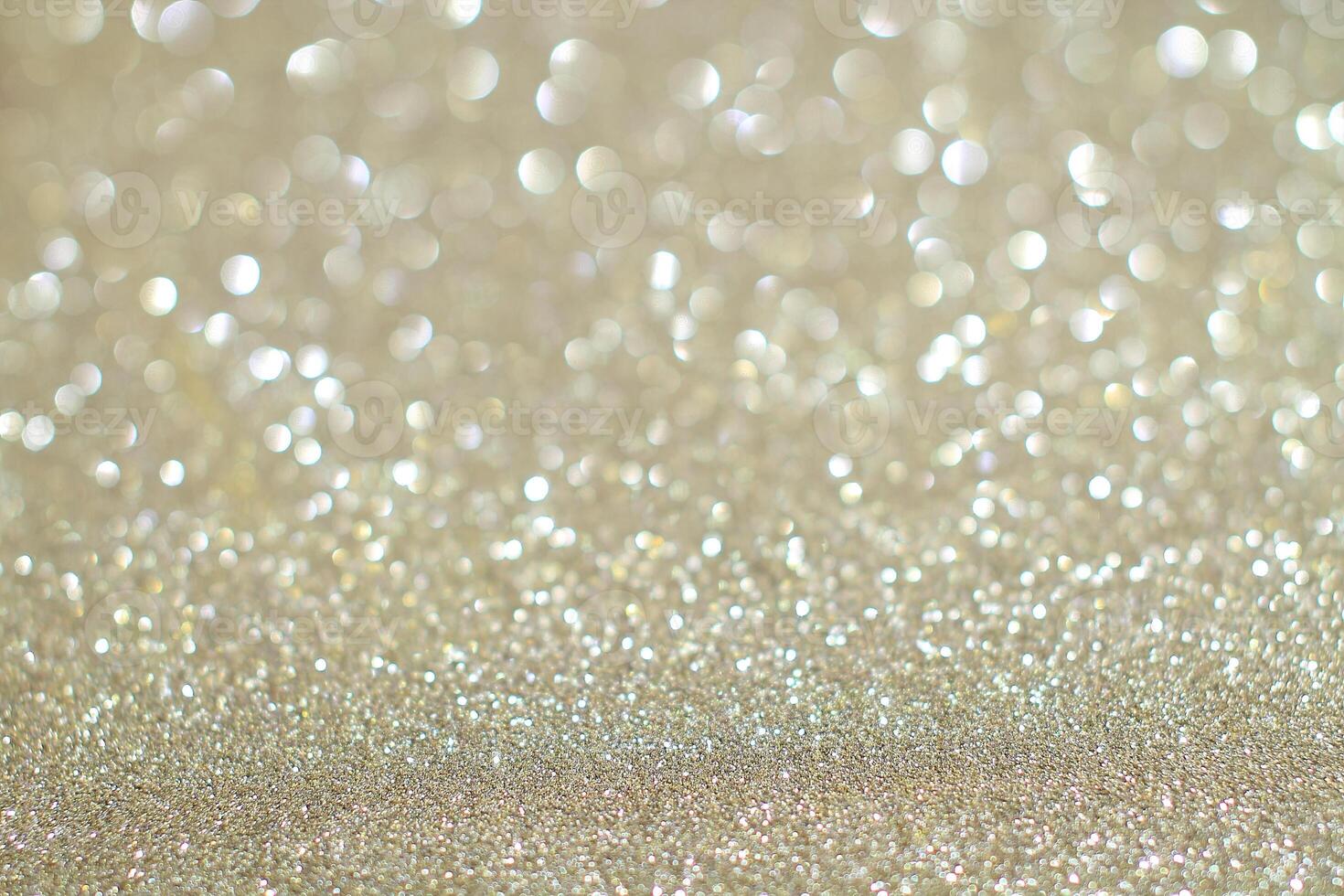 Gold glitter background with bokeh effect photo