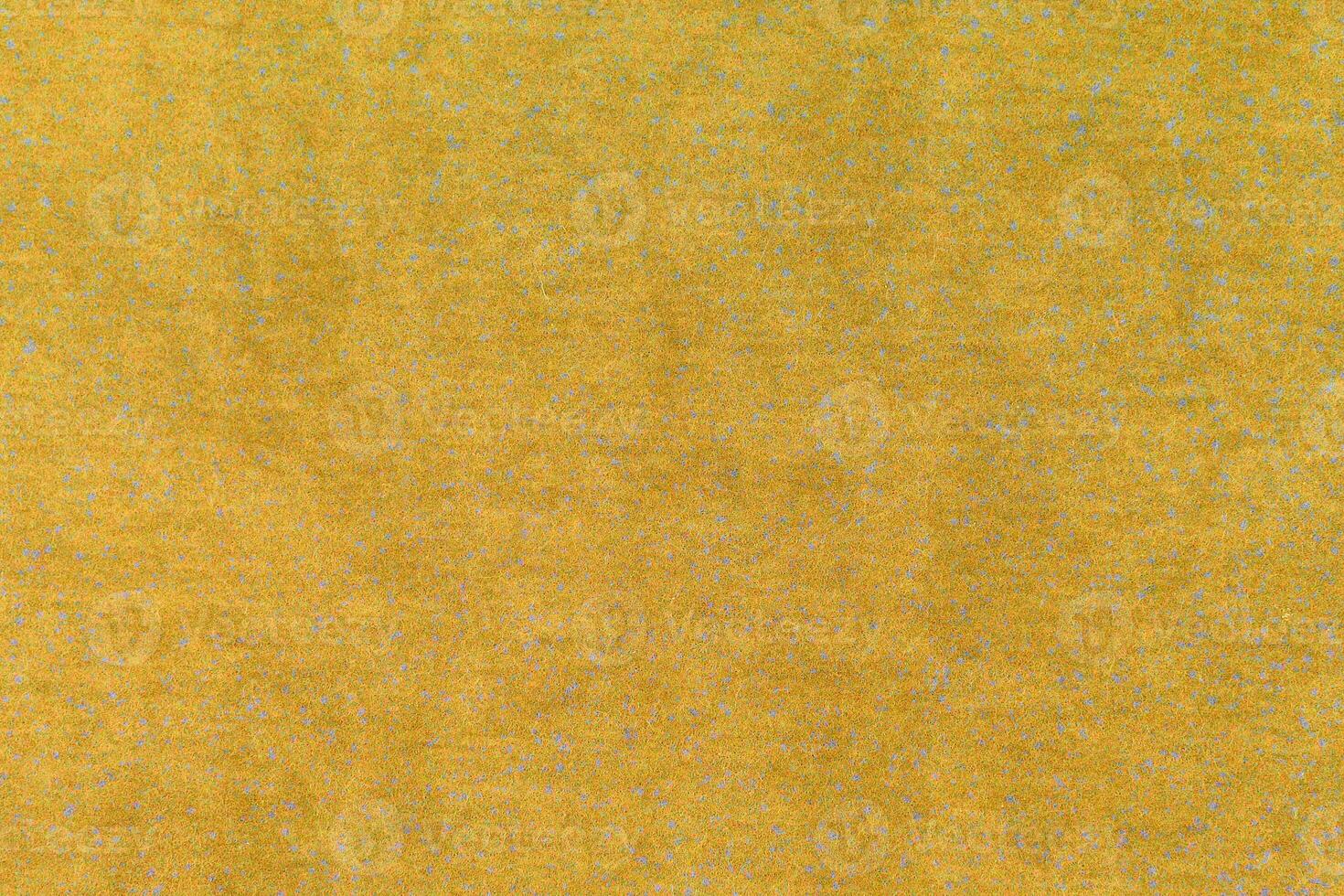 A yellow background with blue dots on it photo