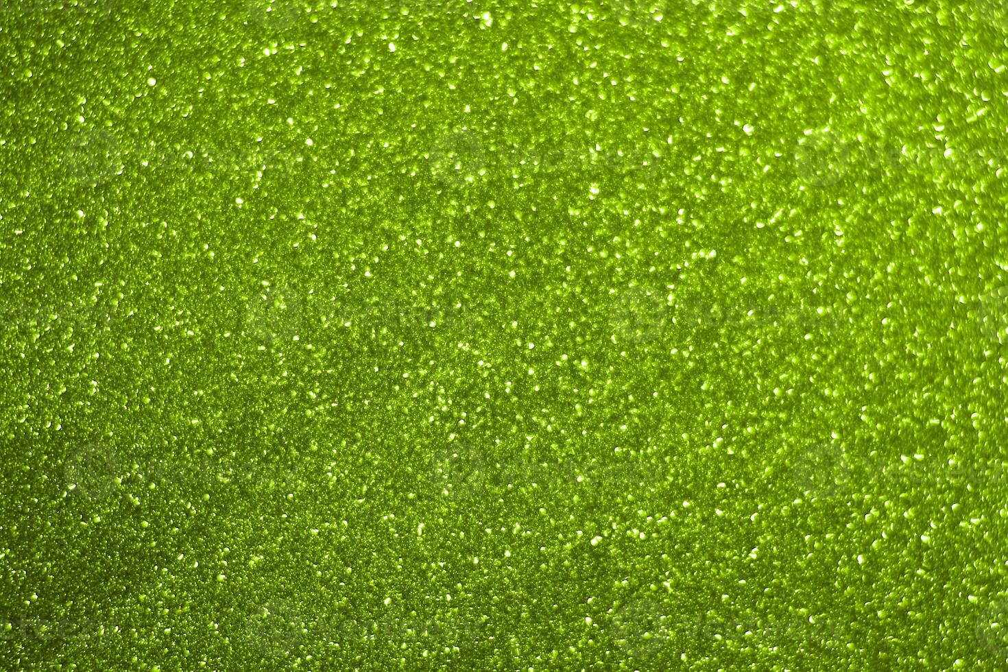 Green glitter background with a green background photo
