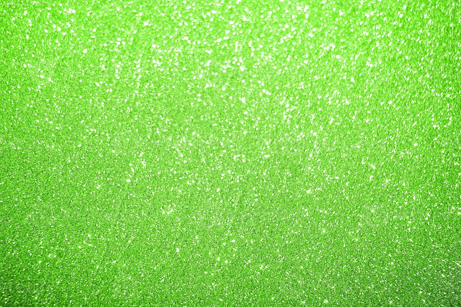 Green glitter texture background photo