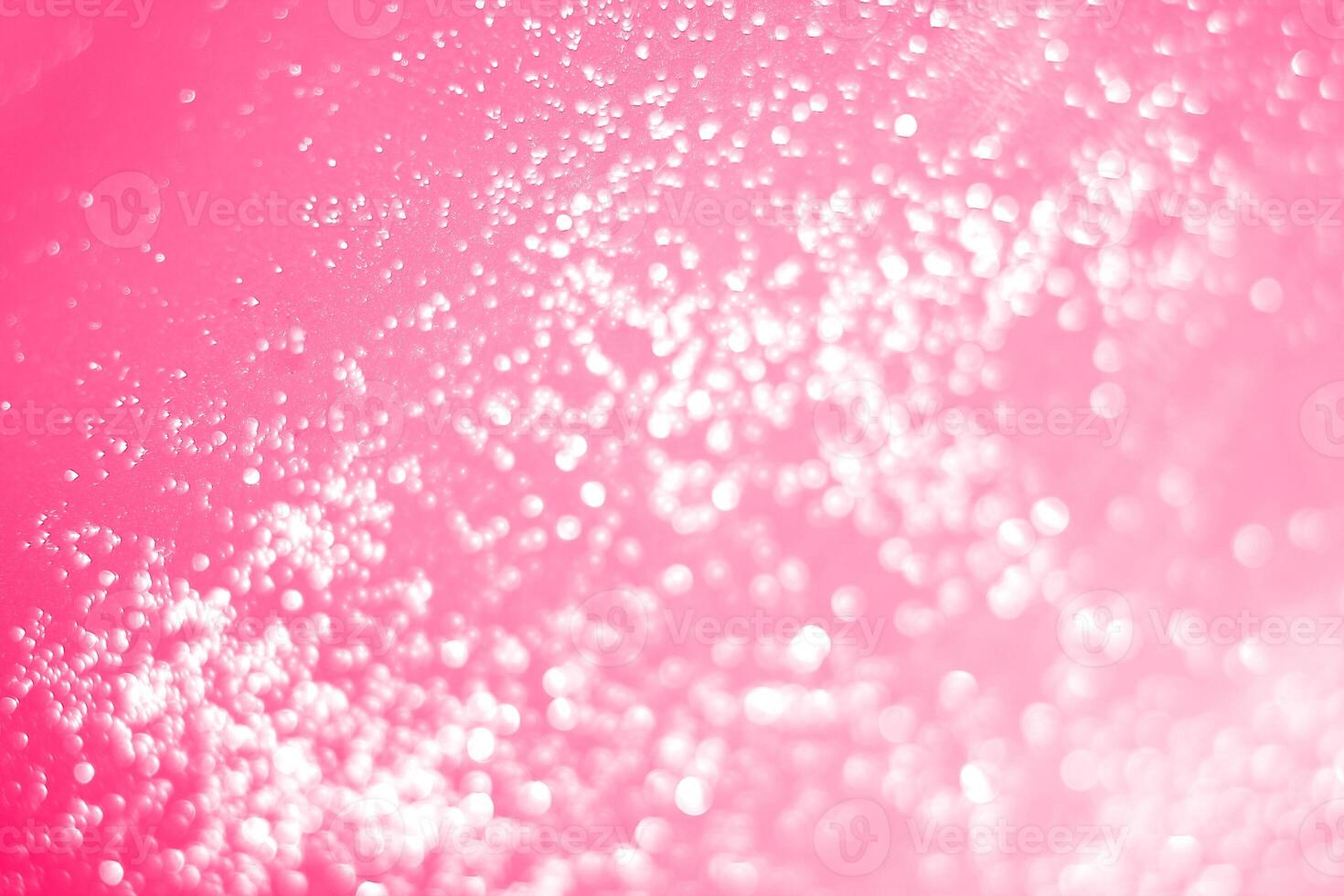 A pink background with bubbles and bubbles photo