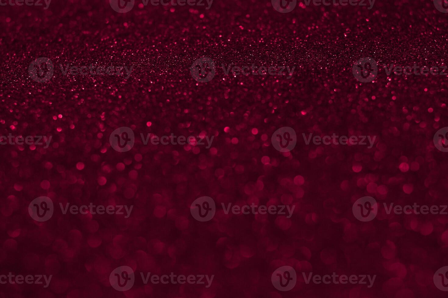 A red glitter background with a red sparkle photo