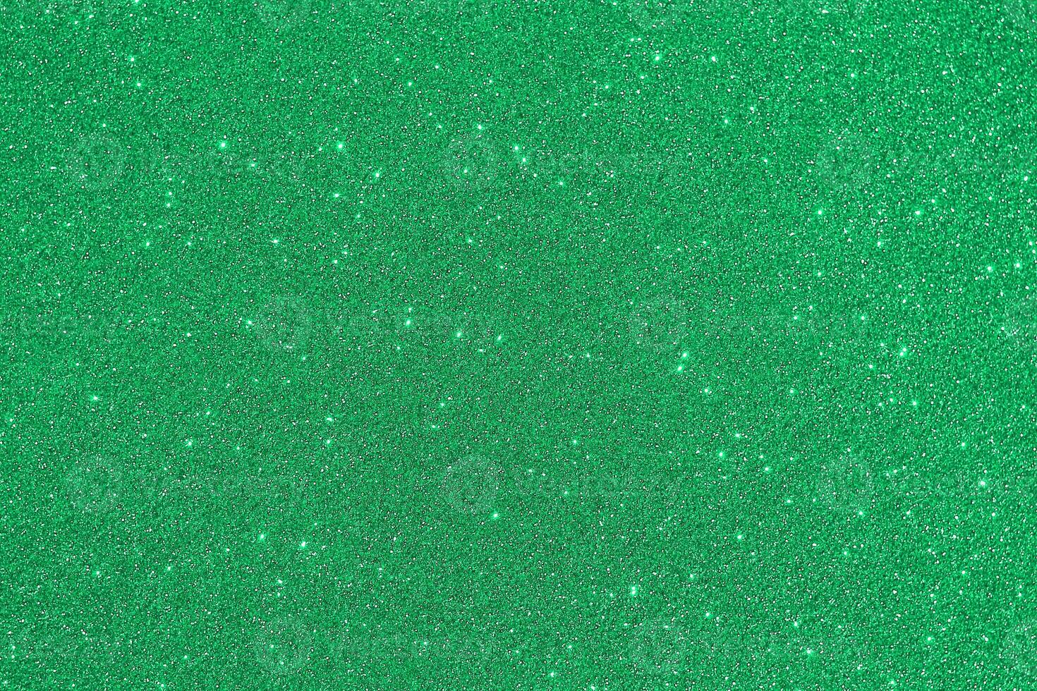 Green glitter background with white stars photo