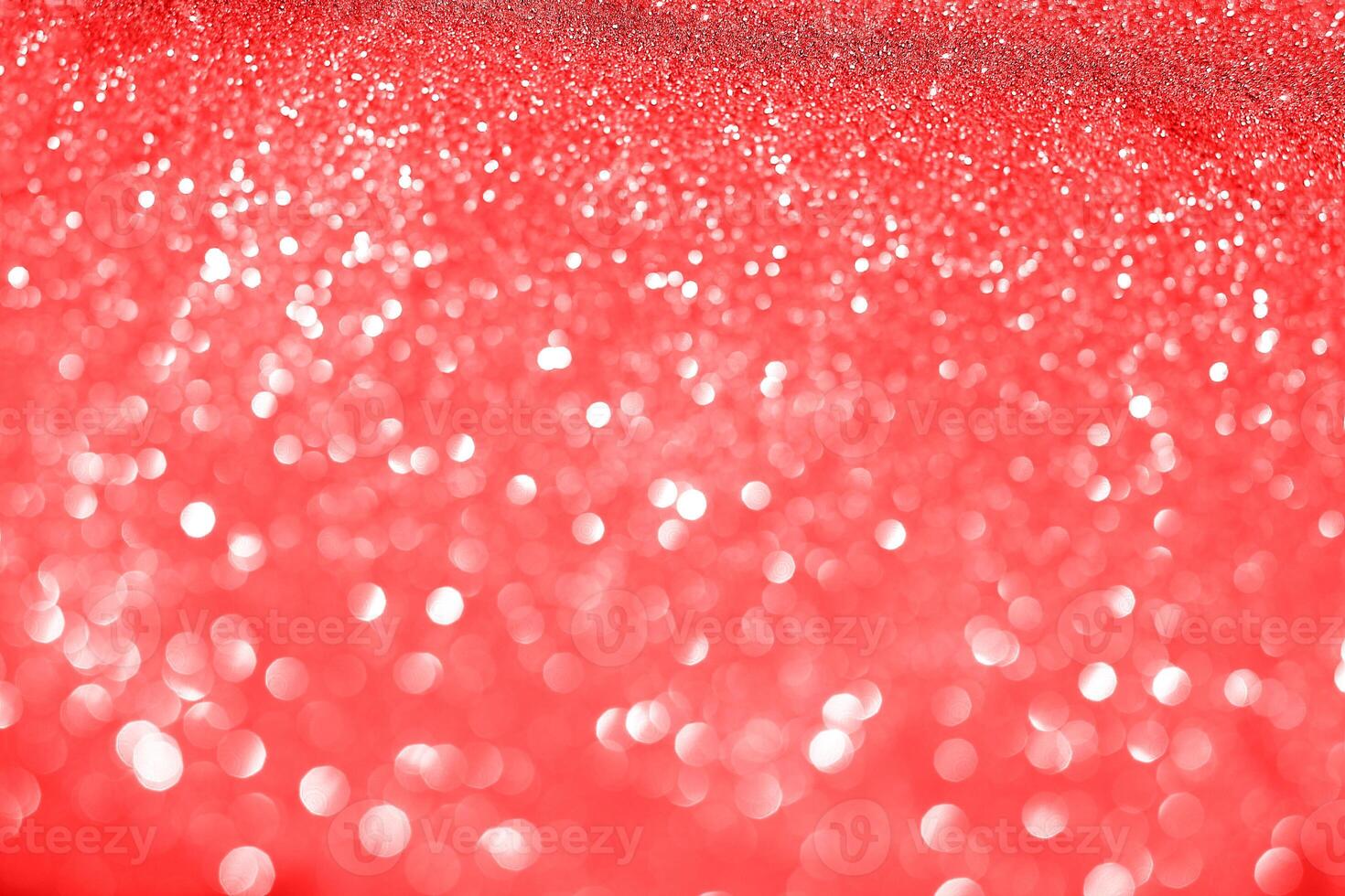Red glitter background with white lights photo