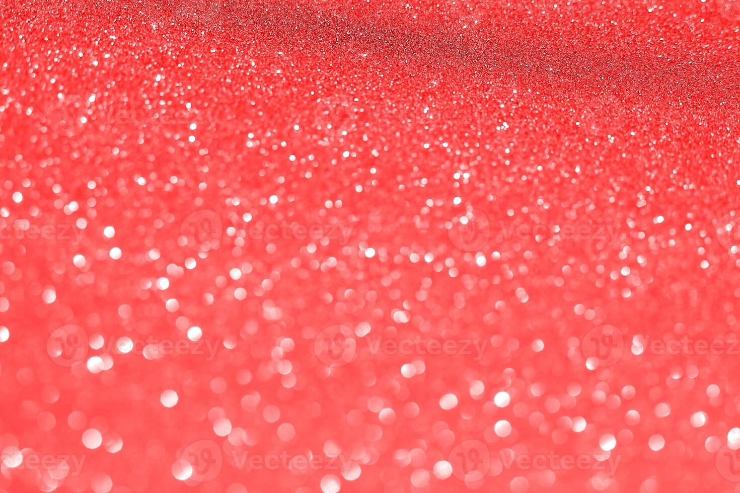 A red background with glitter and sparkles photo
