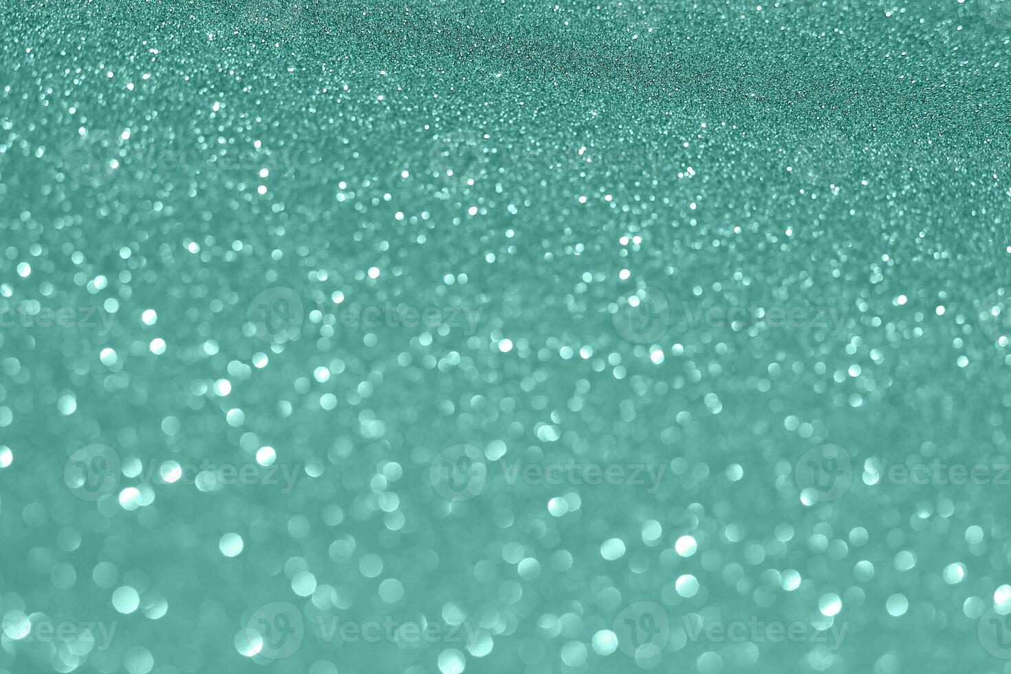 A close up of a turquoise glitter background photo