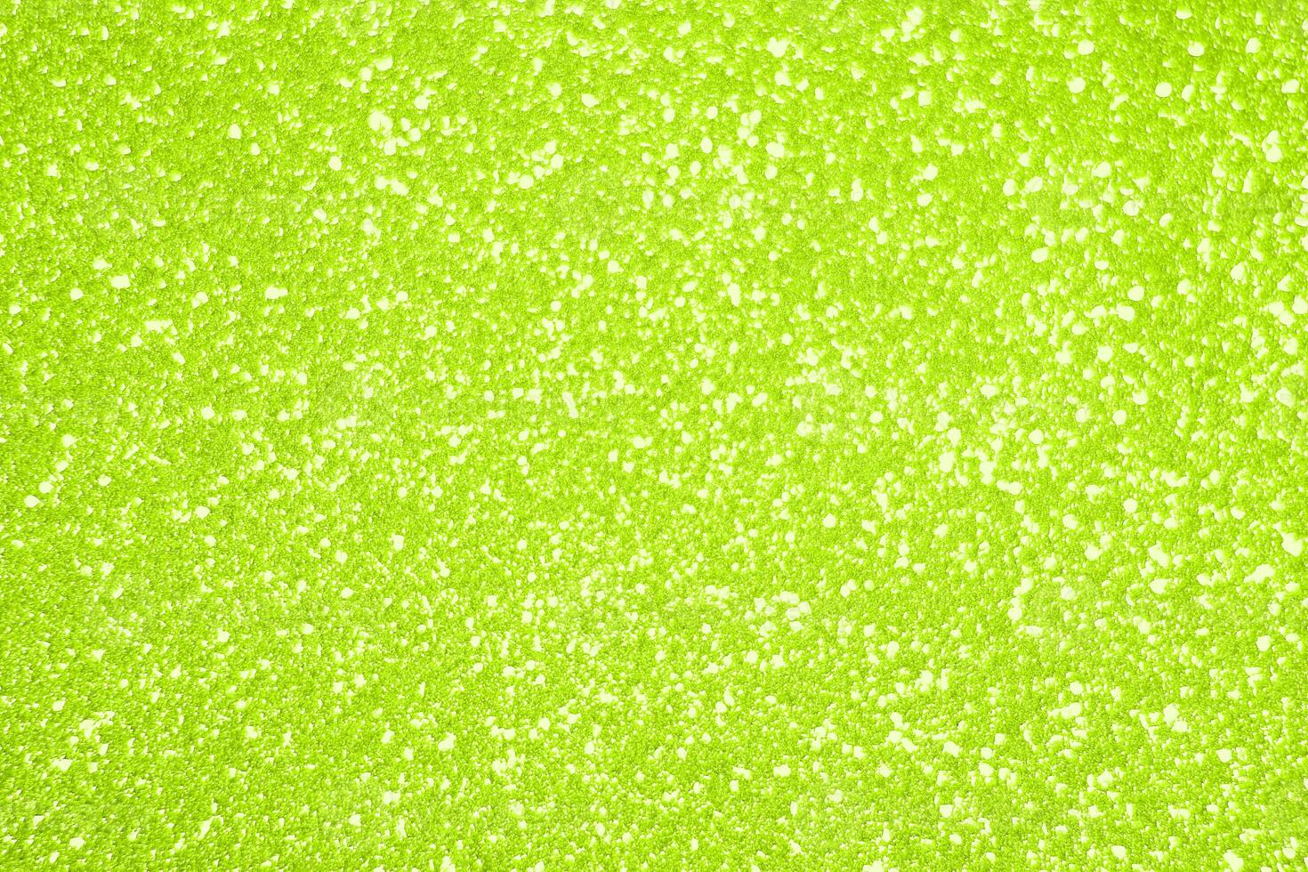 A green background with white spots photo