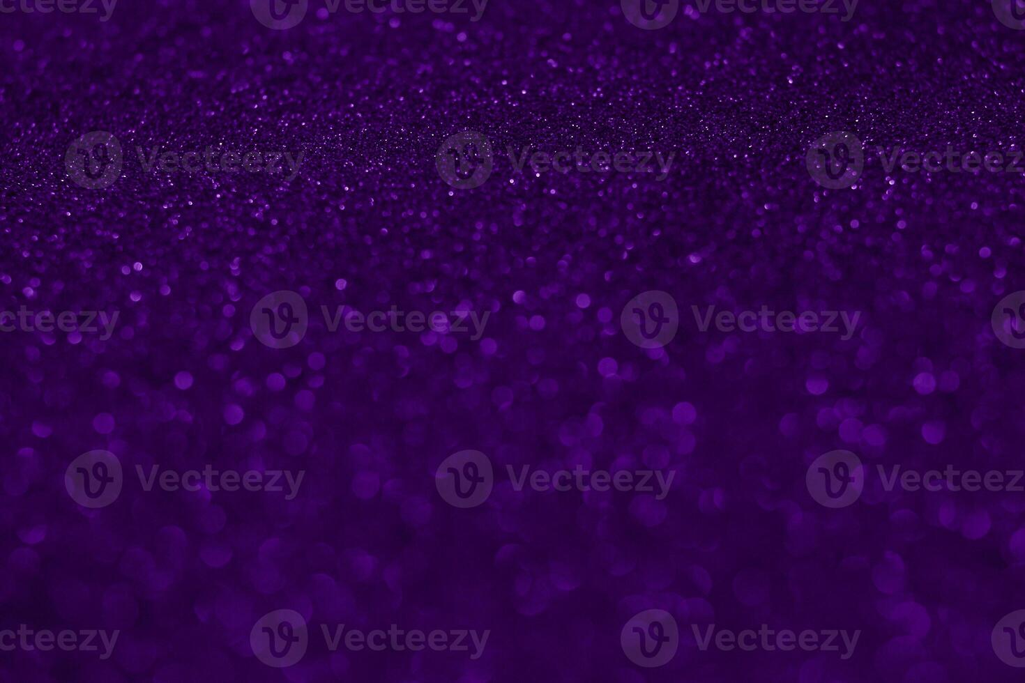Purple glitter background with a black background photo