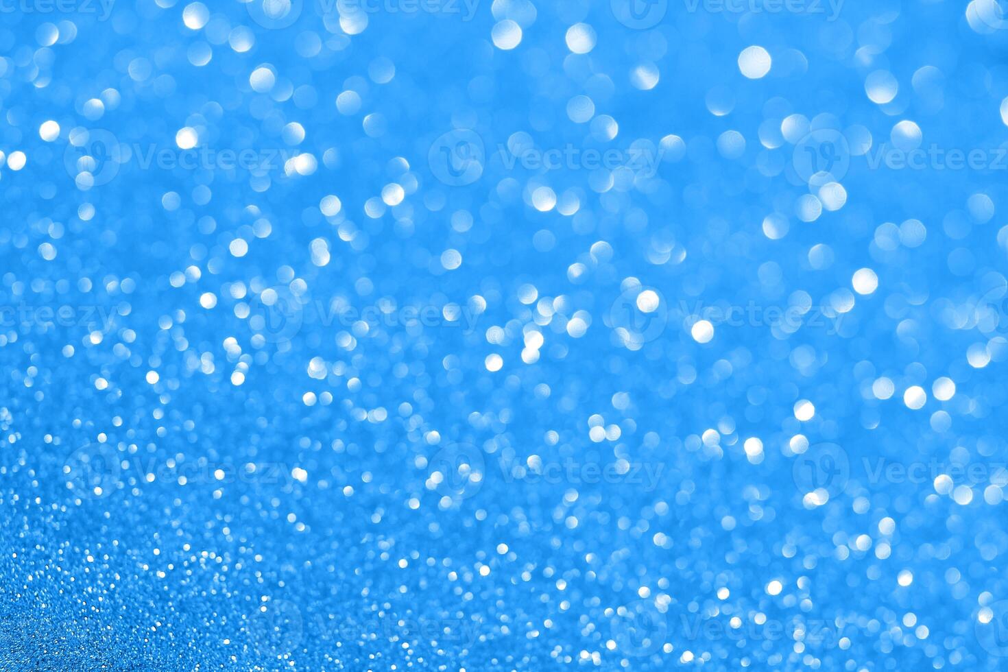 Blue background with snow and water droplets photo