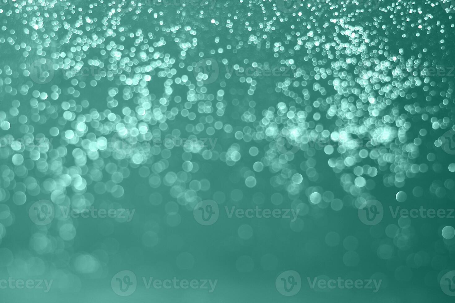 A green background with sparkling lights photo