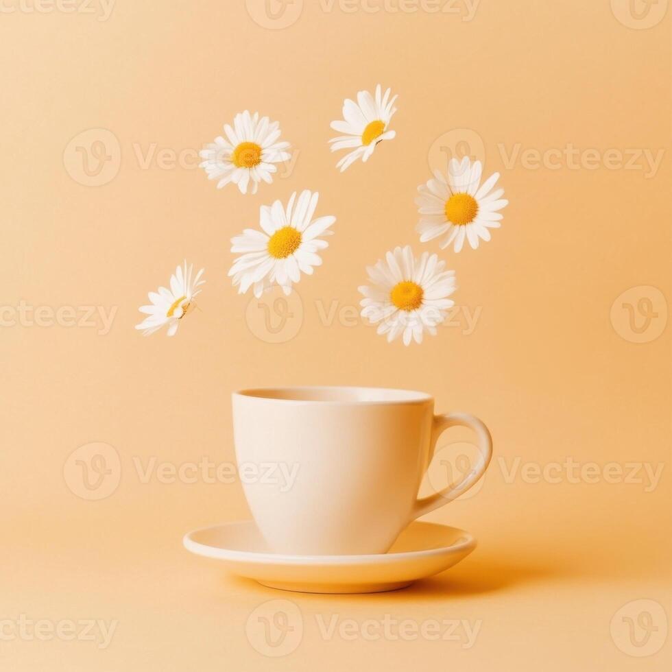 Coffee cup with floating daisies in a warm orange setting creates a whimsical atmosphere for relaxation photo