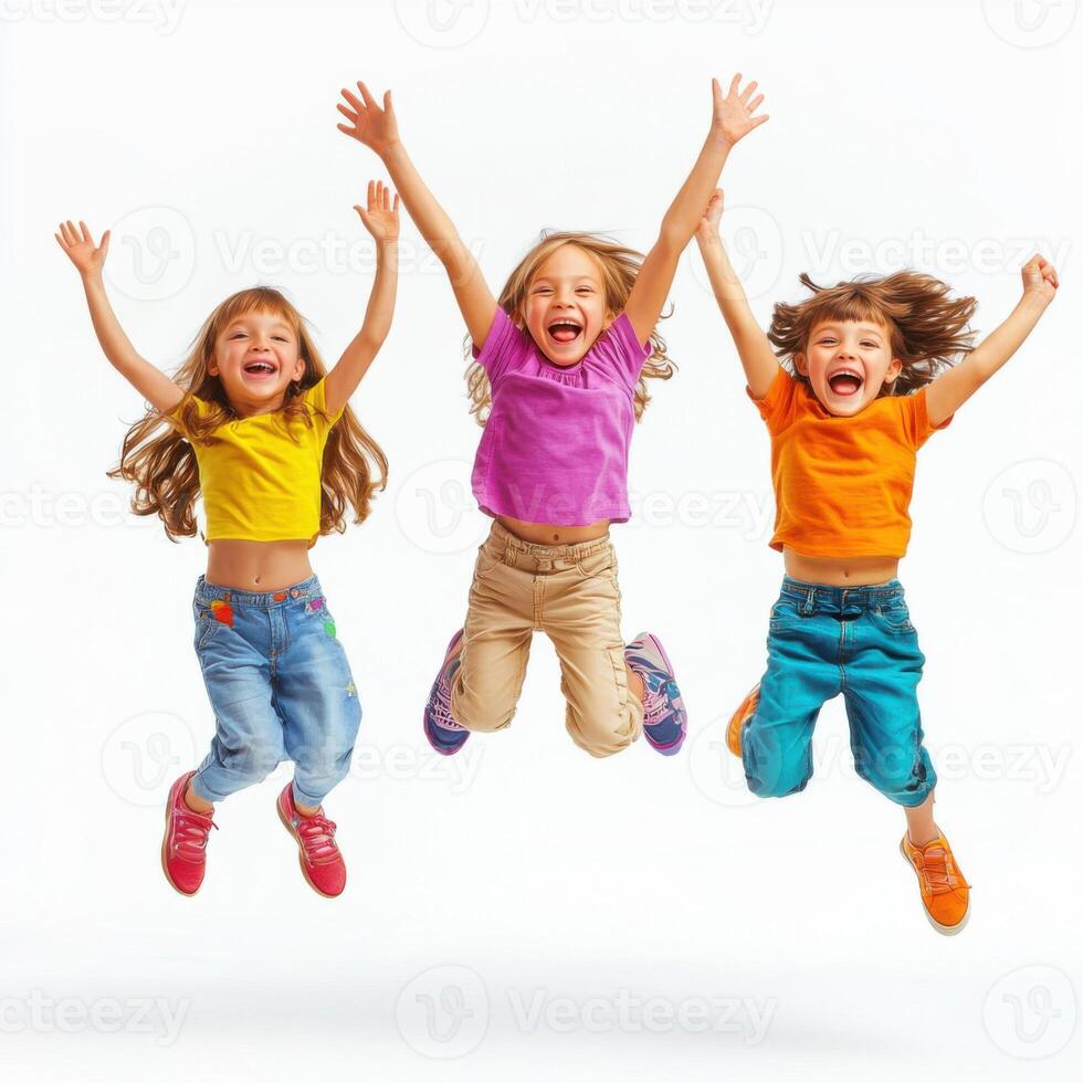 Three children joyfully jumping in a studio photo