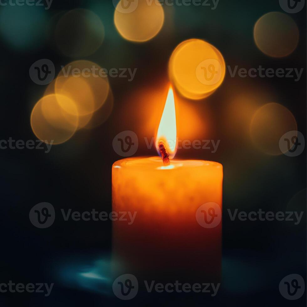 Burning candle with glowing bokeh lights in the background photo