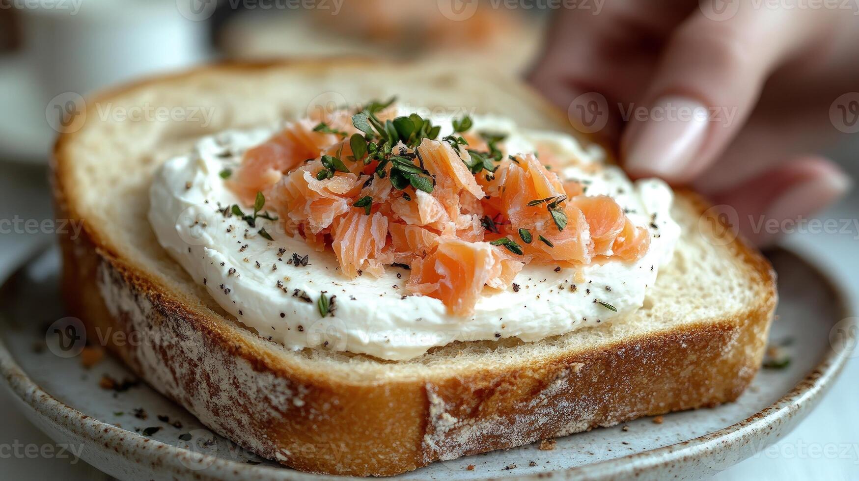 Enjoy smoked salmon on soft bread at a quaint cafe, perfect for a leisurely morning photo