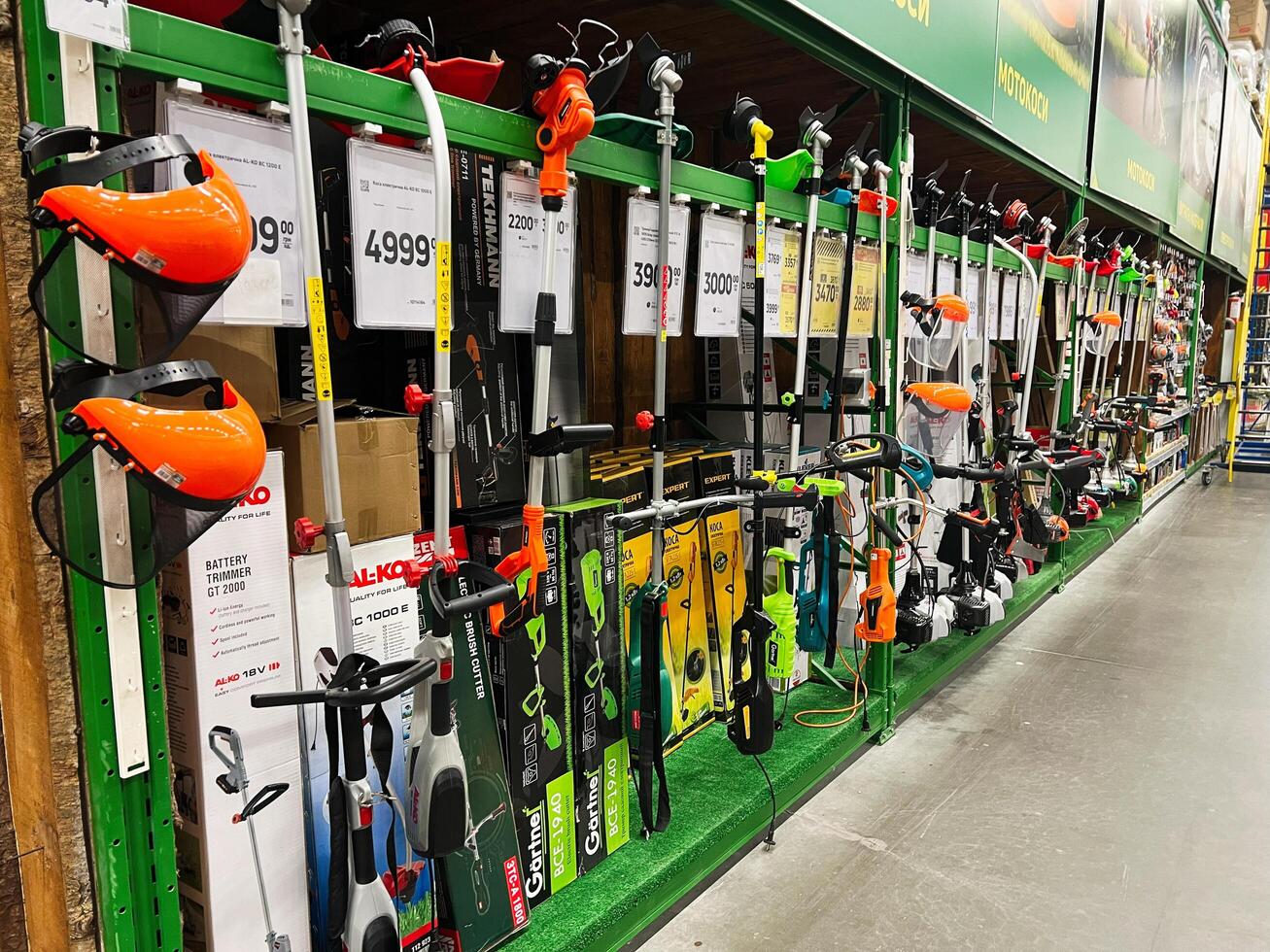 Kyiv, Ukraine - January 03, 2025 Wide selection of gardening tools on display in a home improvement store photo