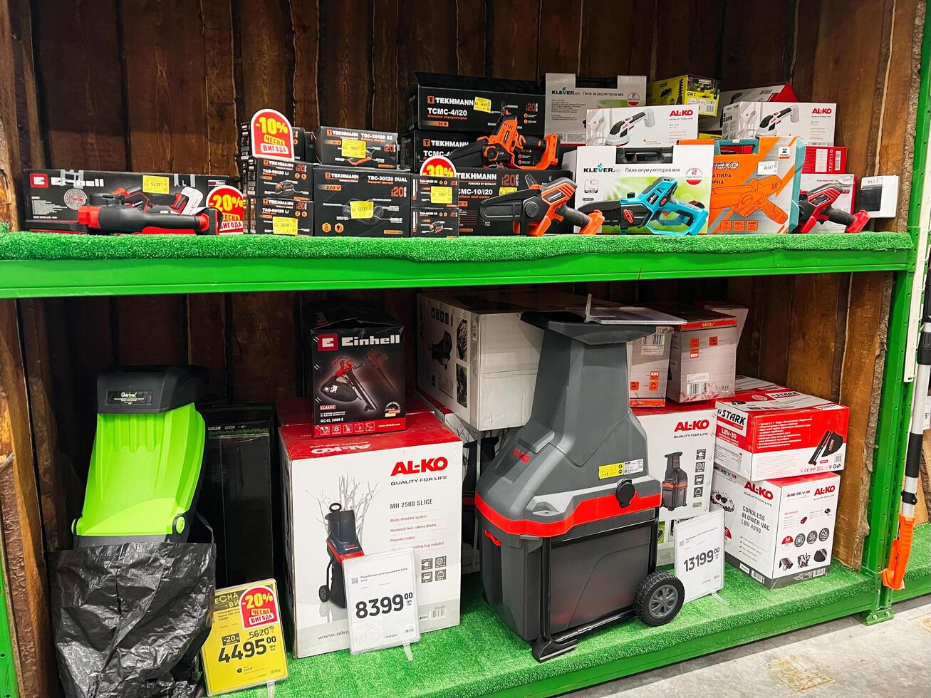 Kyiv, Ukraine - January 03, 2025 Assorted power tools and equipment displayed on organized store shelves photo