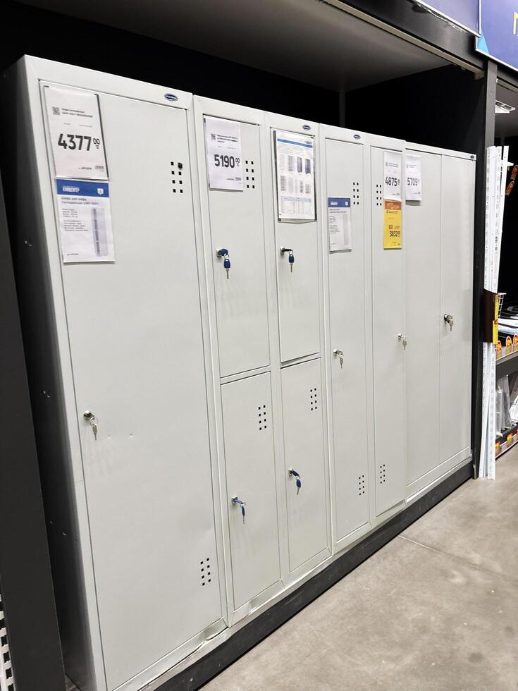 Kyiv, Ukraine - January 03, 2025 Row of metal storage lockers in a store with price tags displayed photo