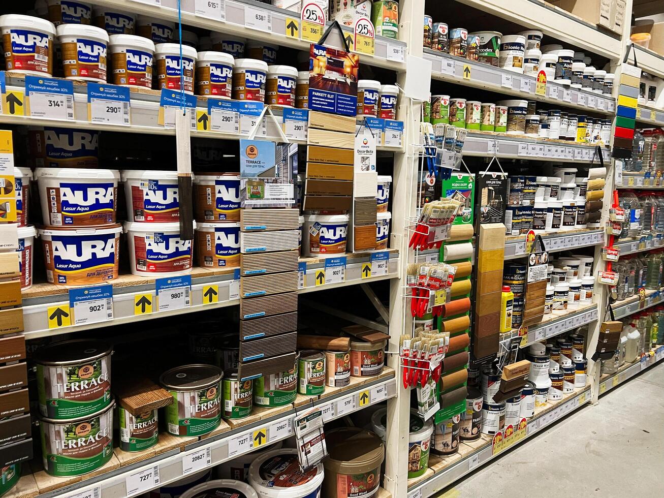 Kyiv, Ukraine - January 03, 2025 Shelves With Assorted Paint Supplies in a Home Improvement Store photo